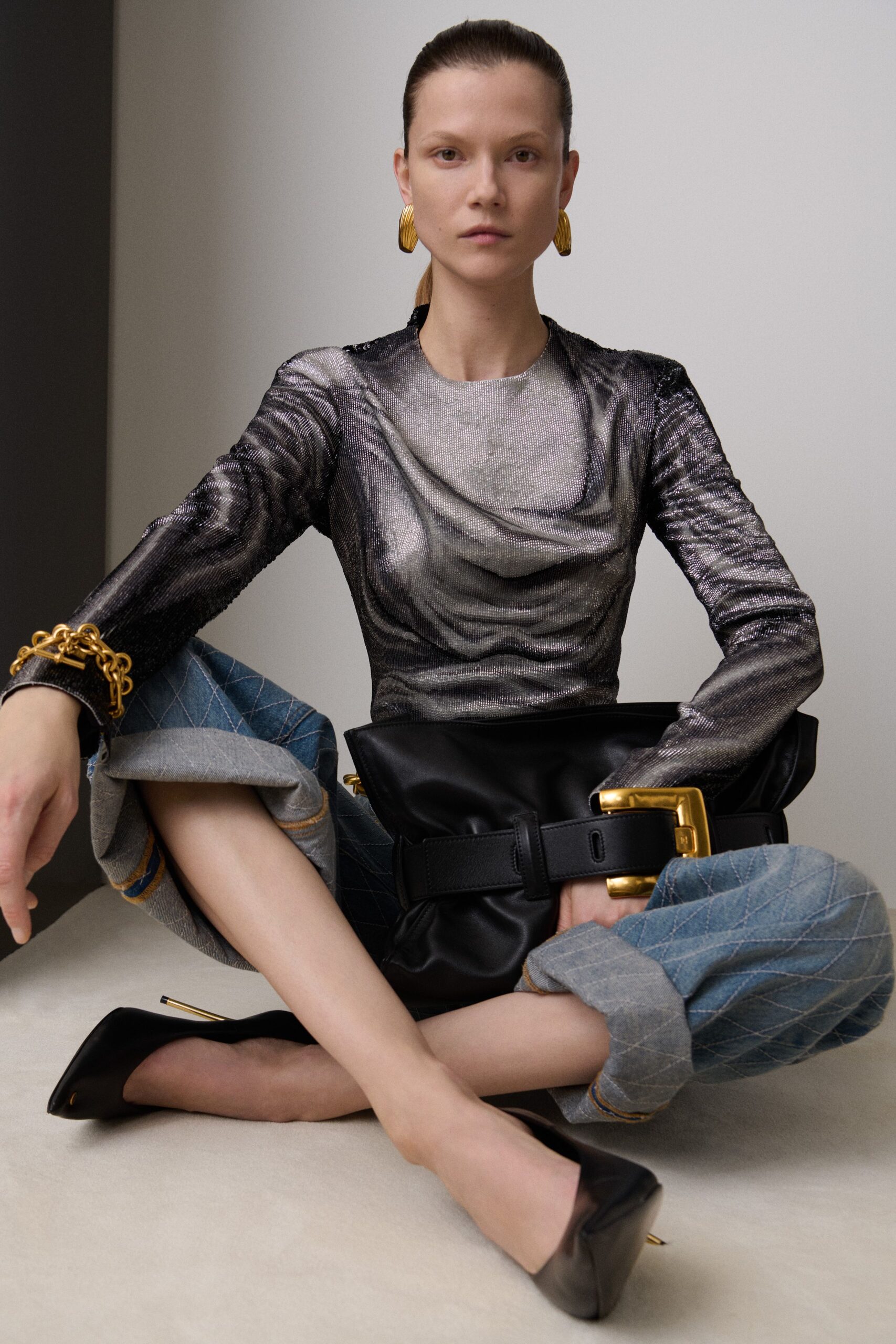 gray silk long-sleeve high-neck fitted draped shiny top