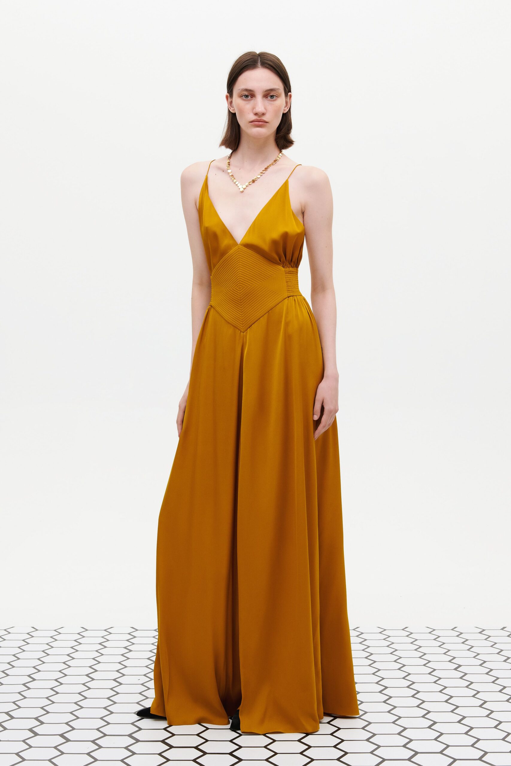 gold silk sleeveless gown
