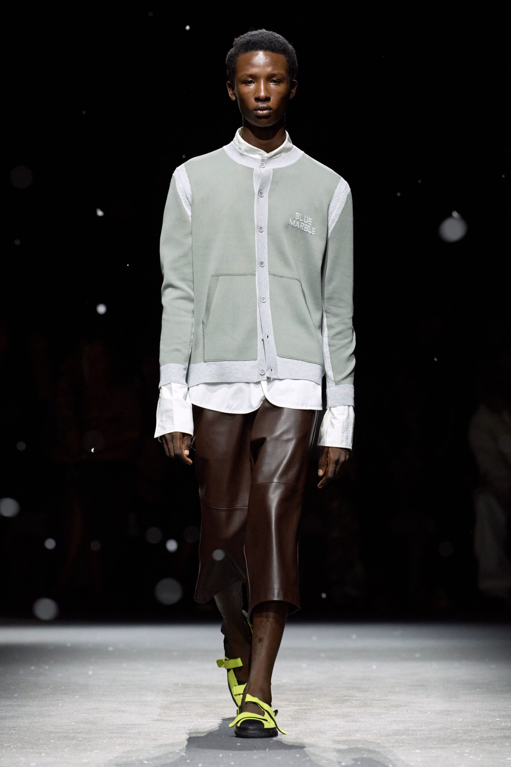 green relaxed jacket with brown pants