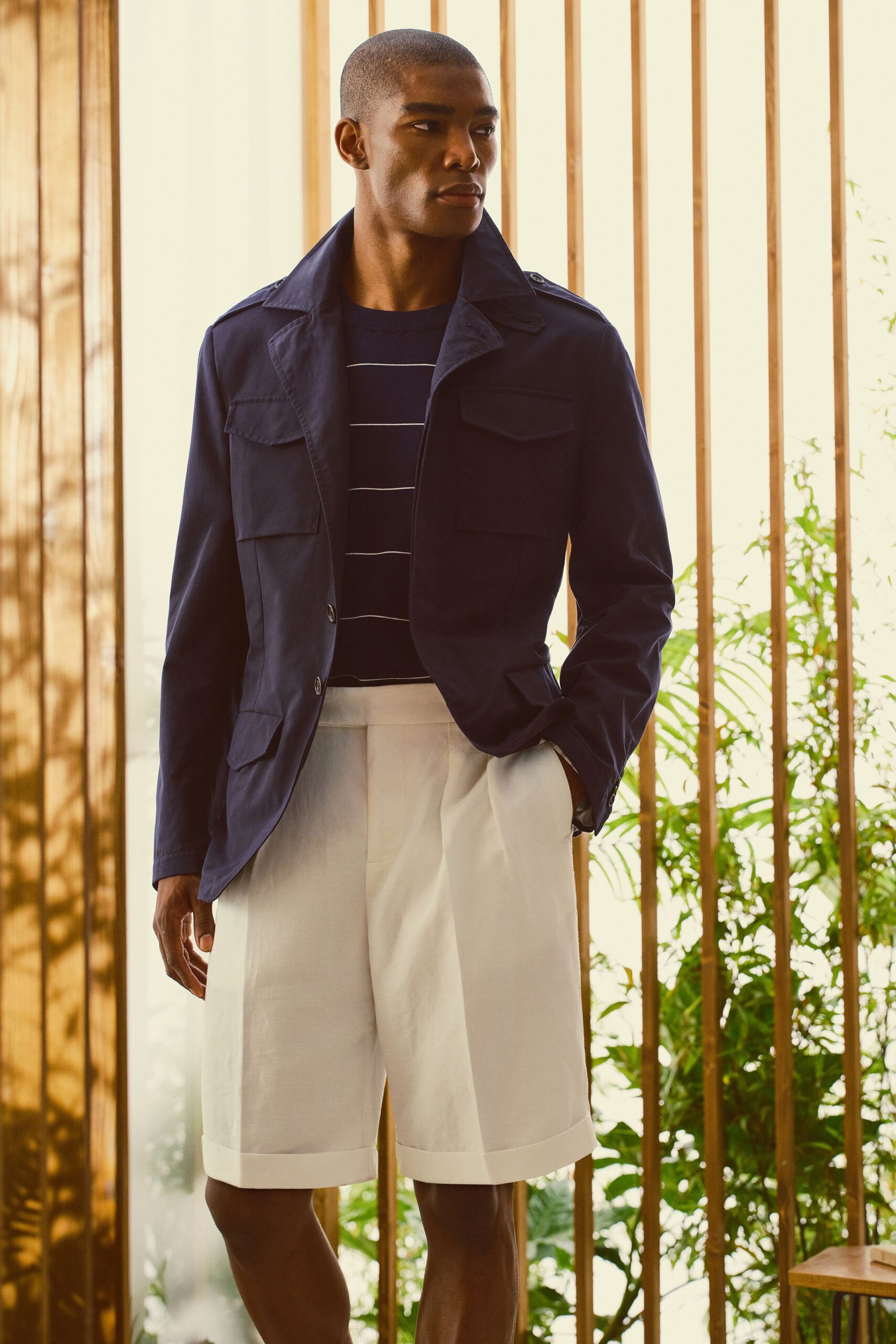 blue cotton long-sleeve collared structured buttoned jacket