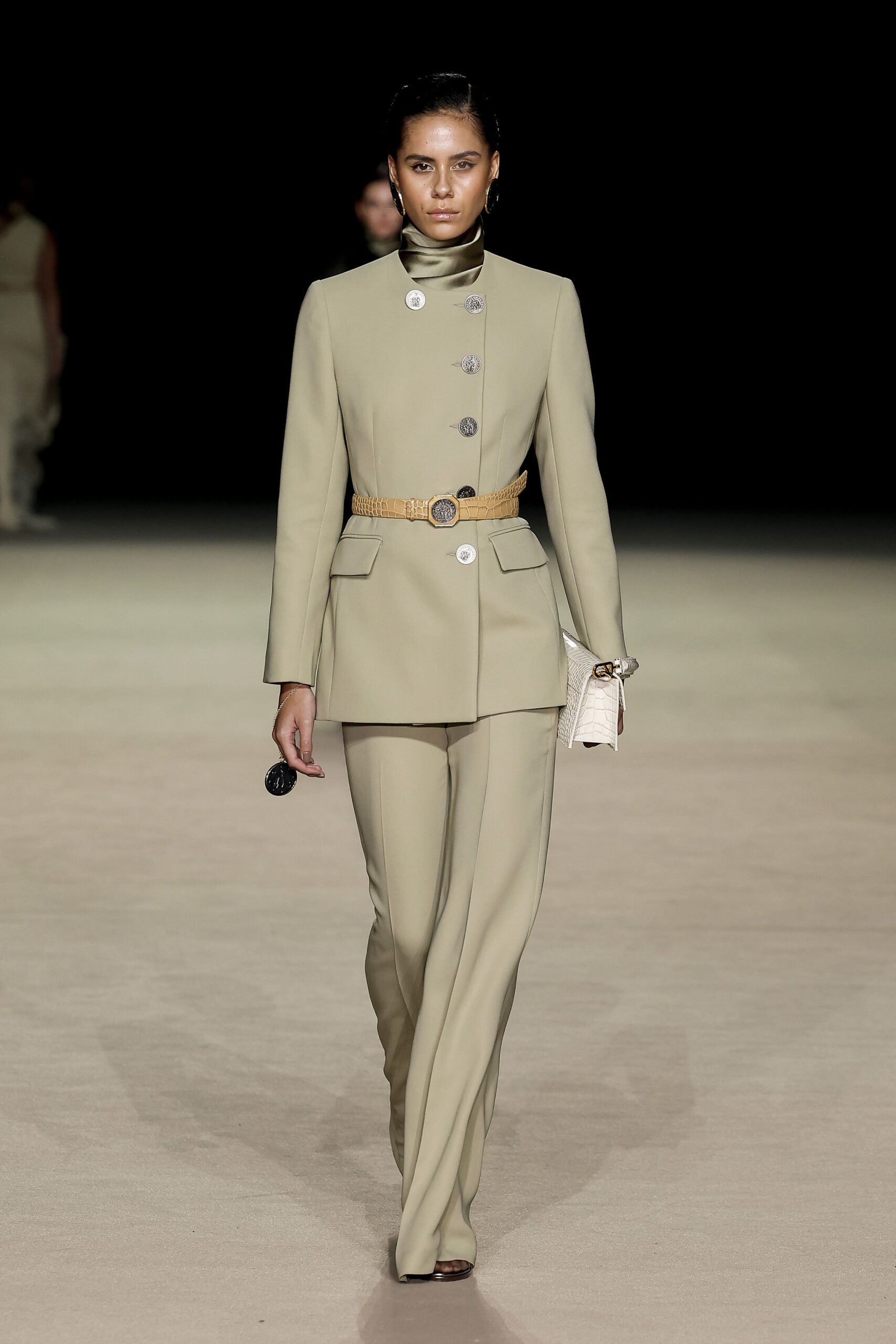 beige tailored suit with accessories