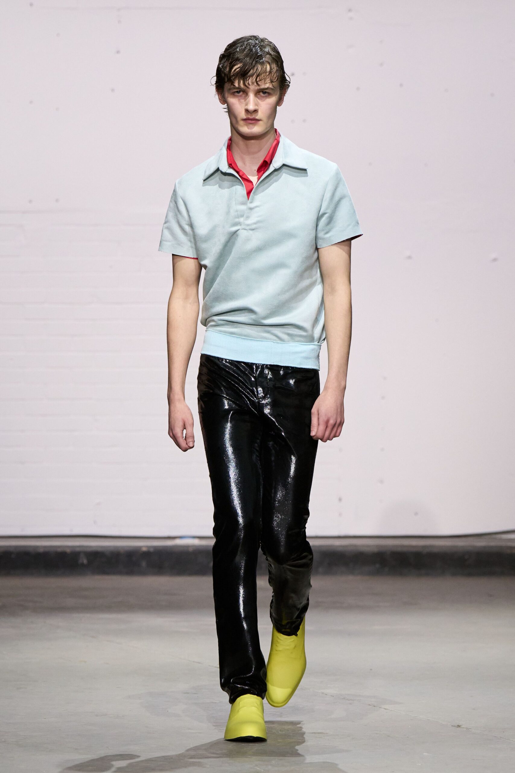 black vinyl slim straight-leg shiny pants