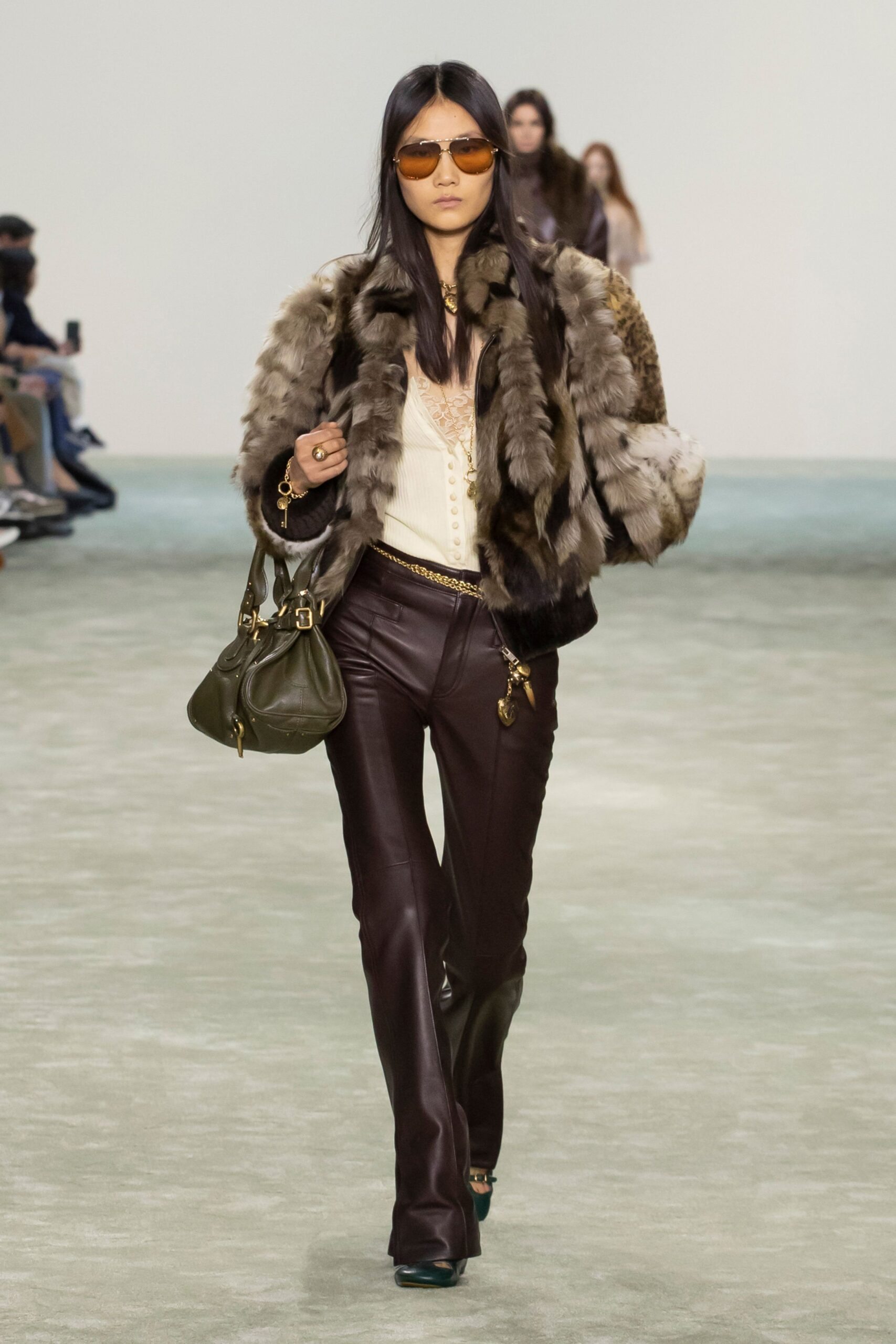 brown fur coat with leather pants