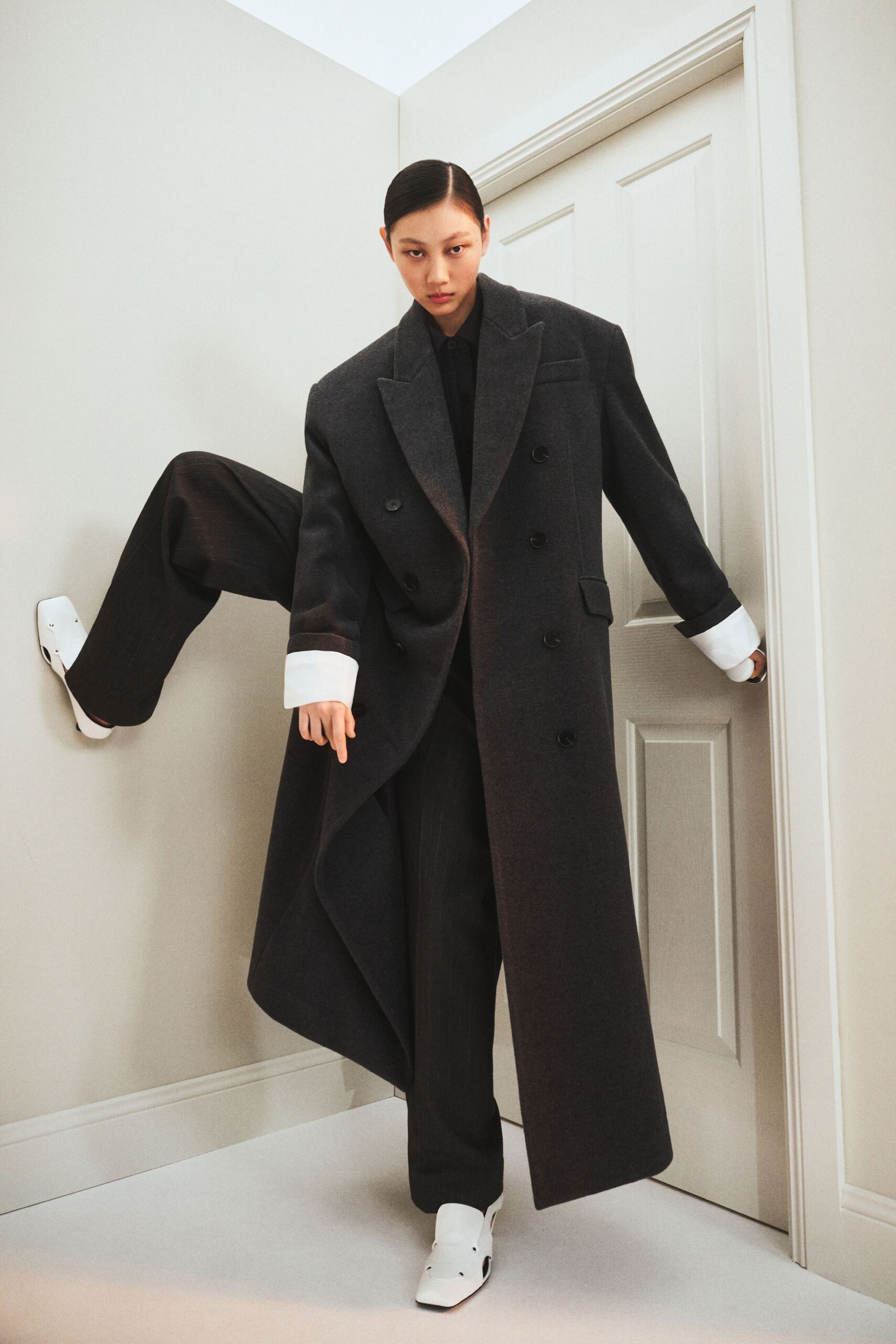 black wool long-sleeve collared oversized maxi coat