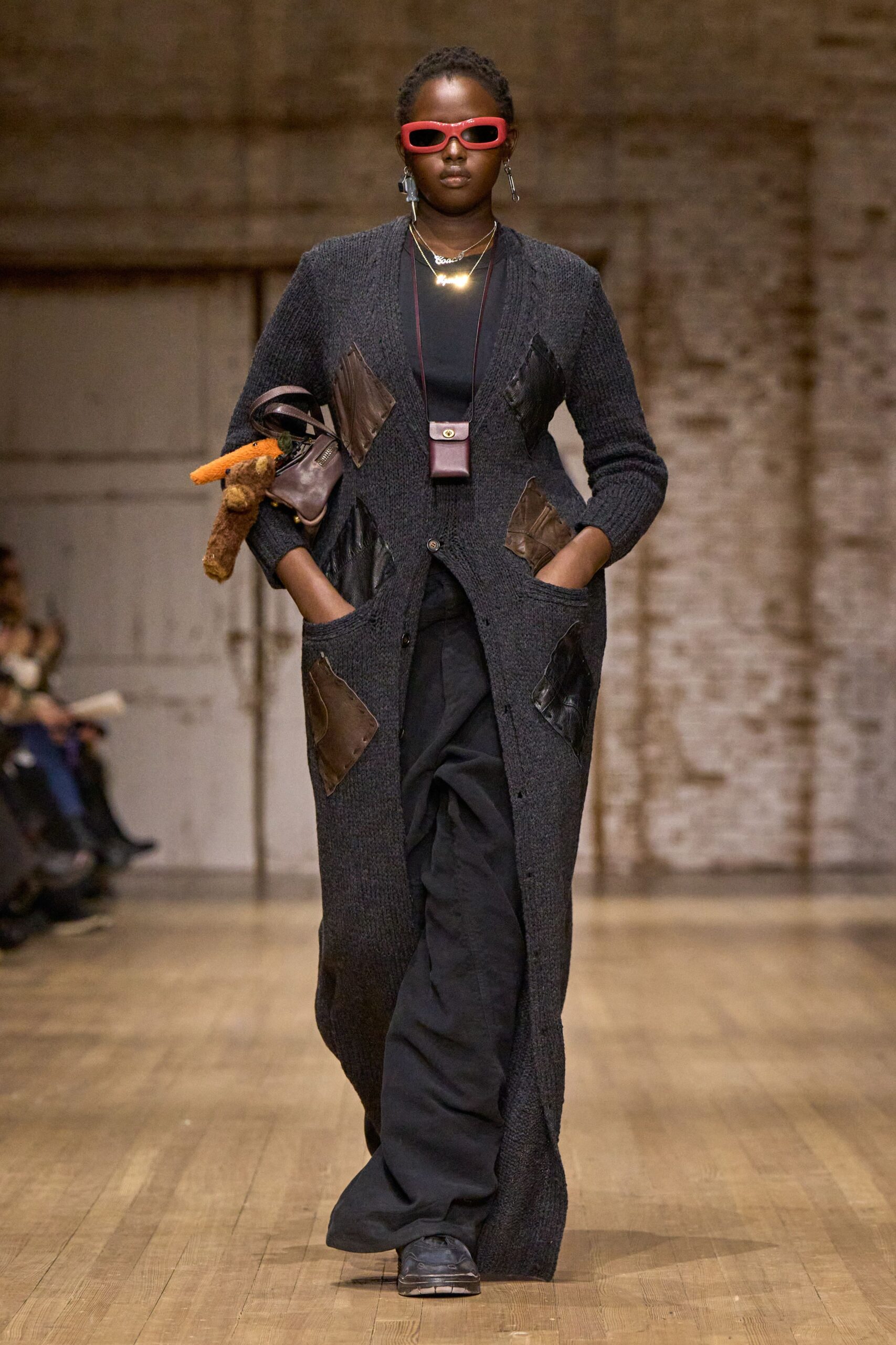 black wool coat with leather details