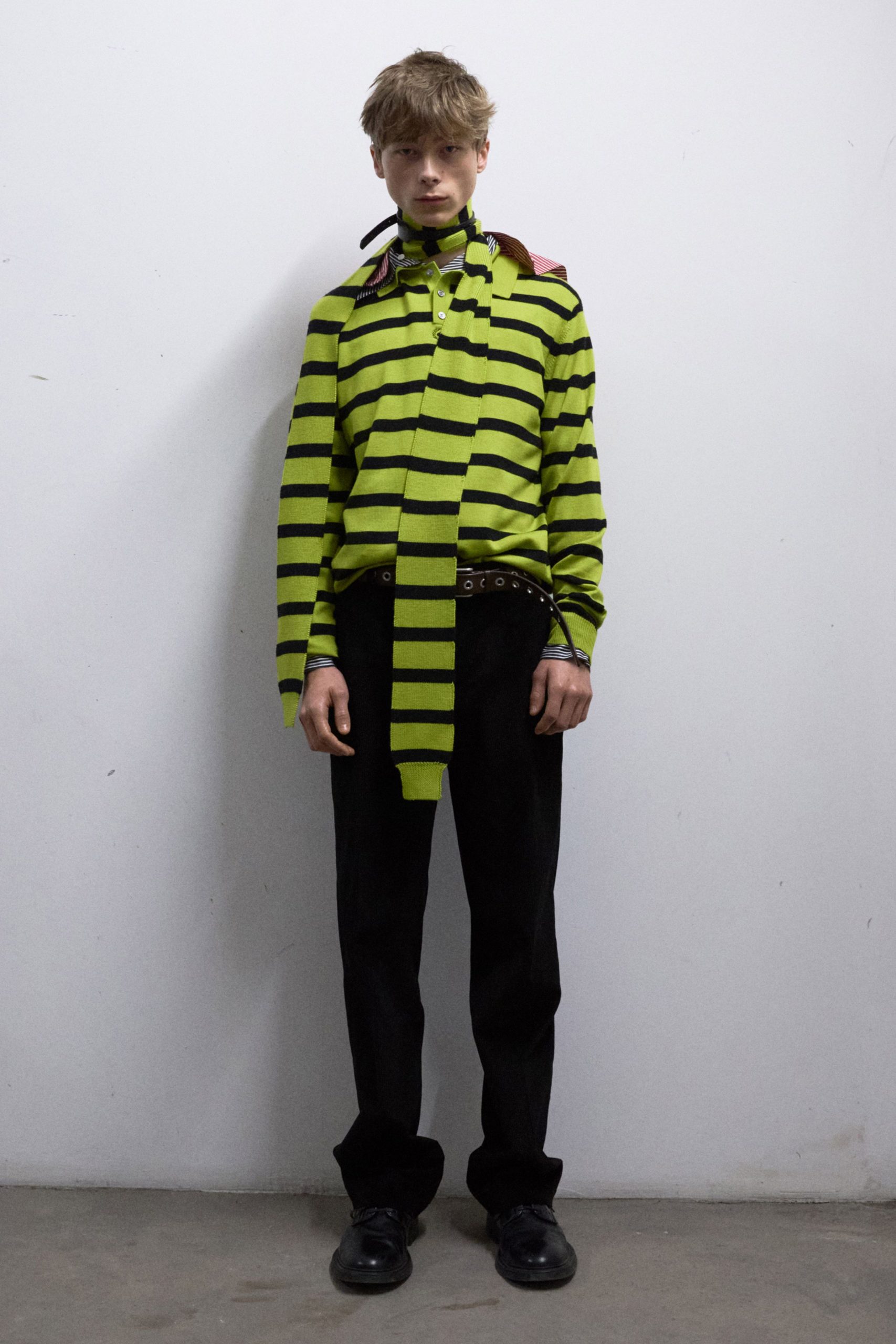 green striped shirt black pants