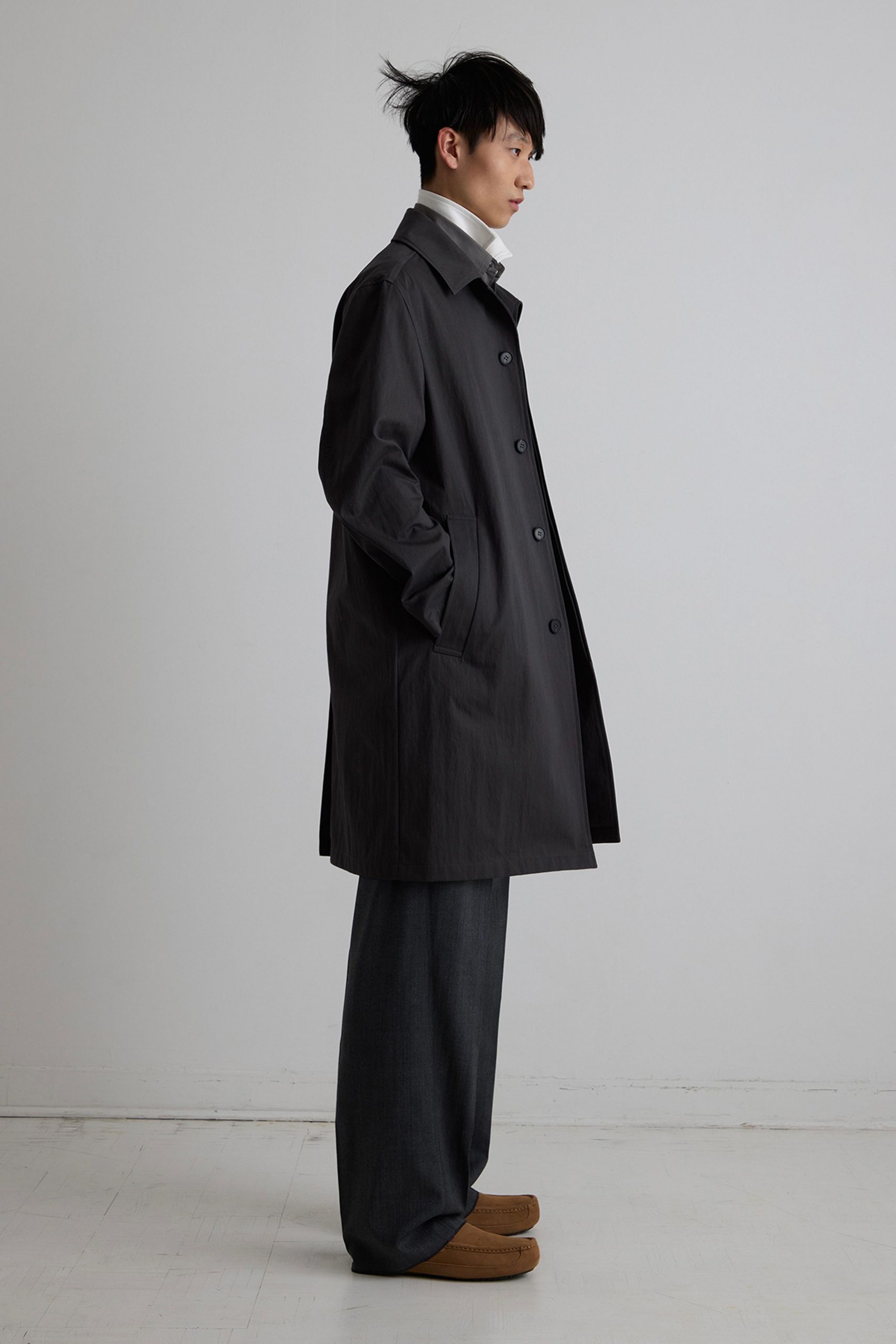 black coat gray pants brown shoes