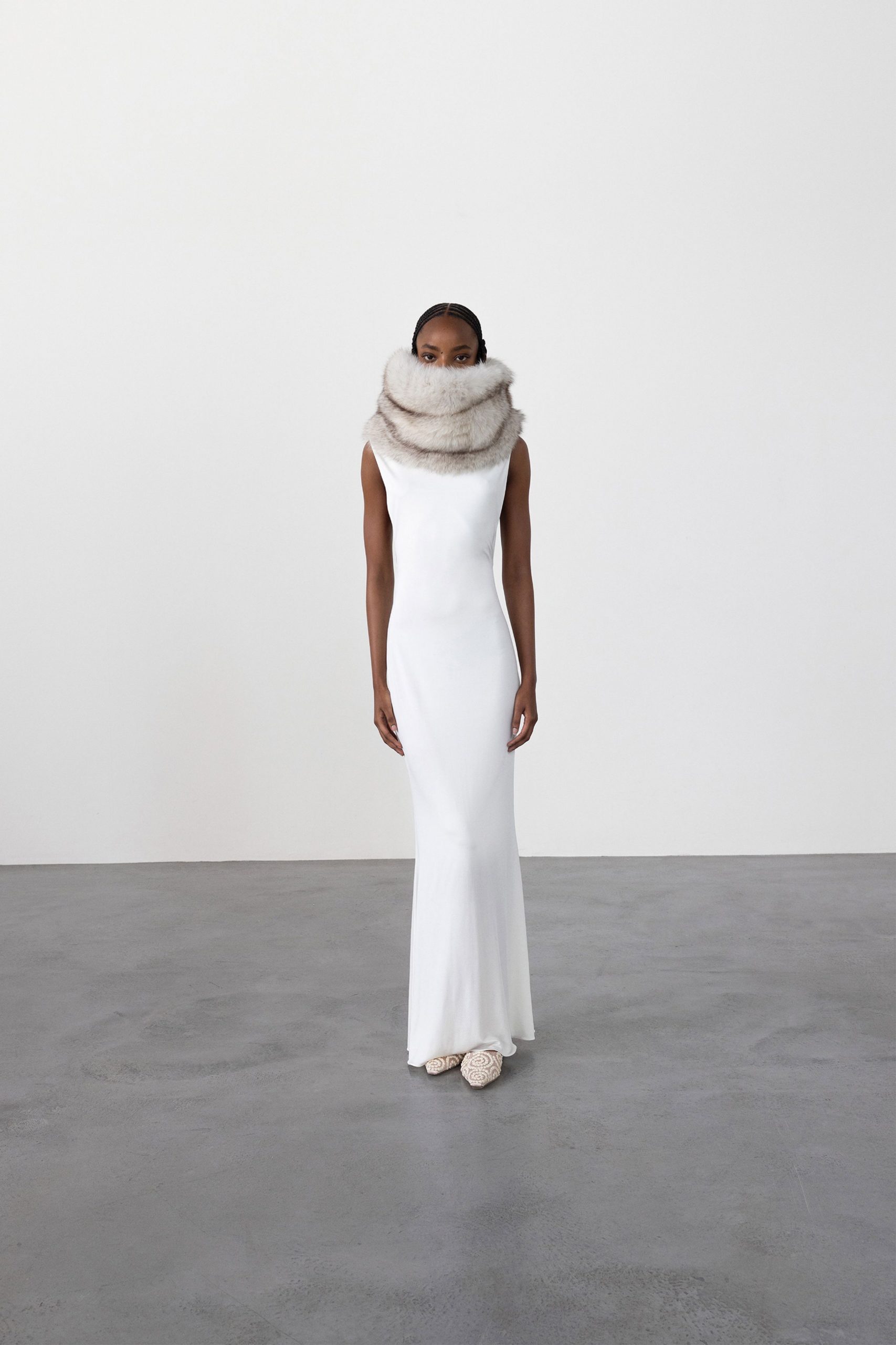 white fitted gown with gray scarf