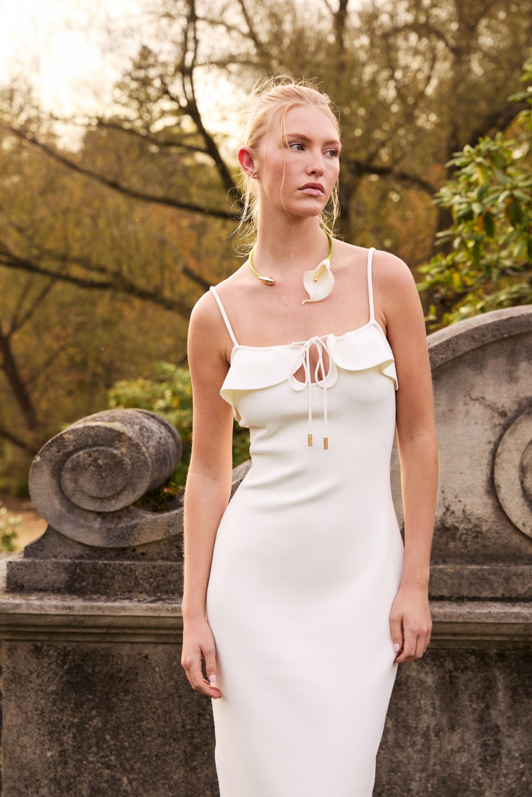 white fitted sleeveless dress