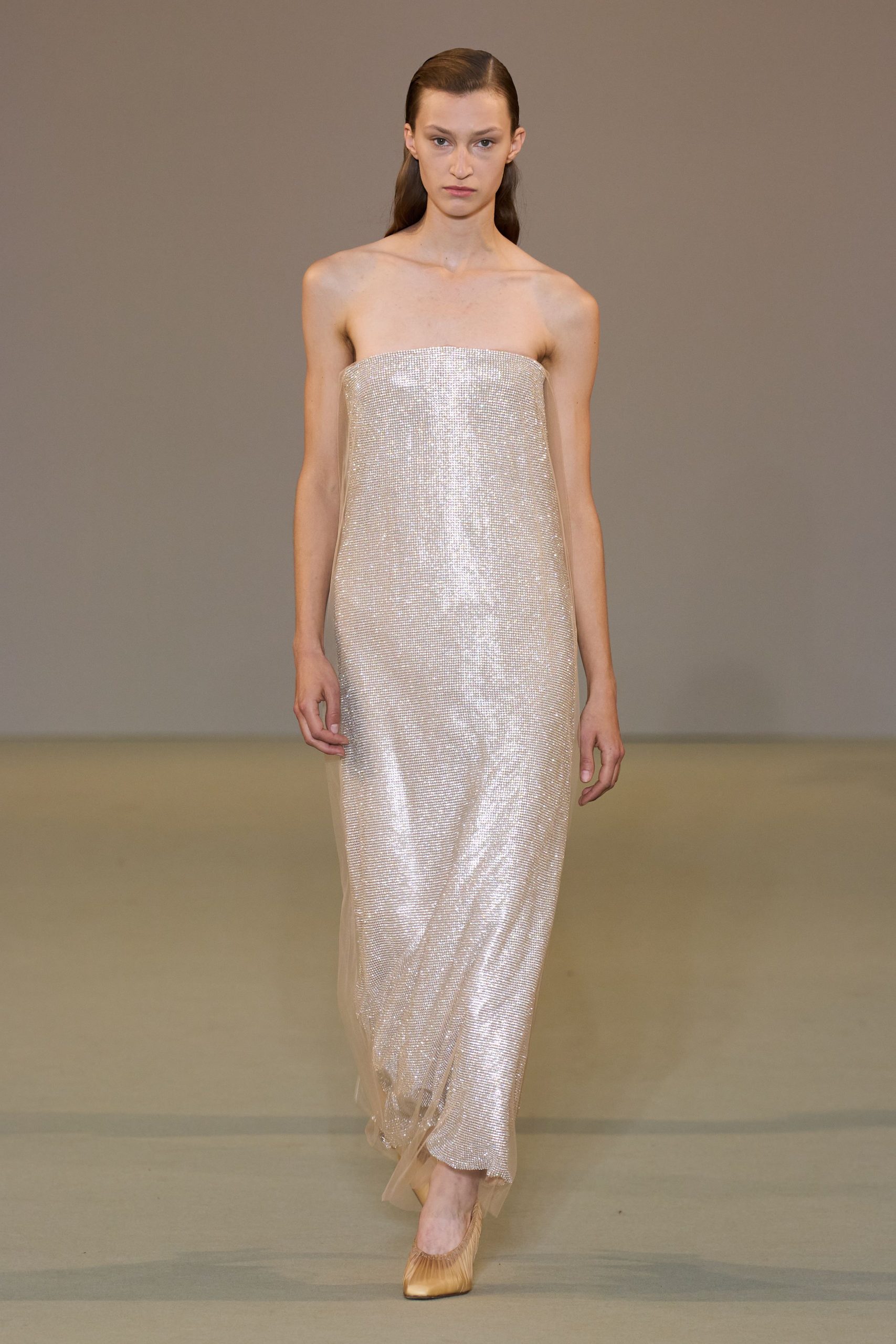 gold silk strapless fitted sequined draped shiny gown