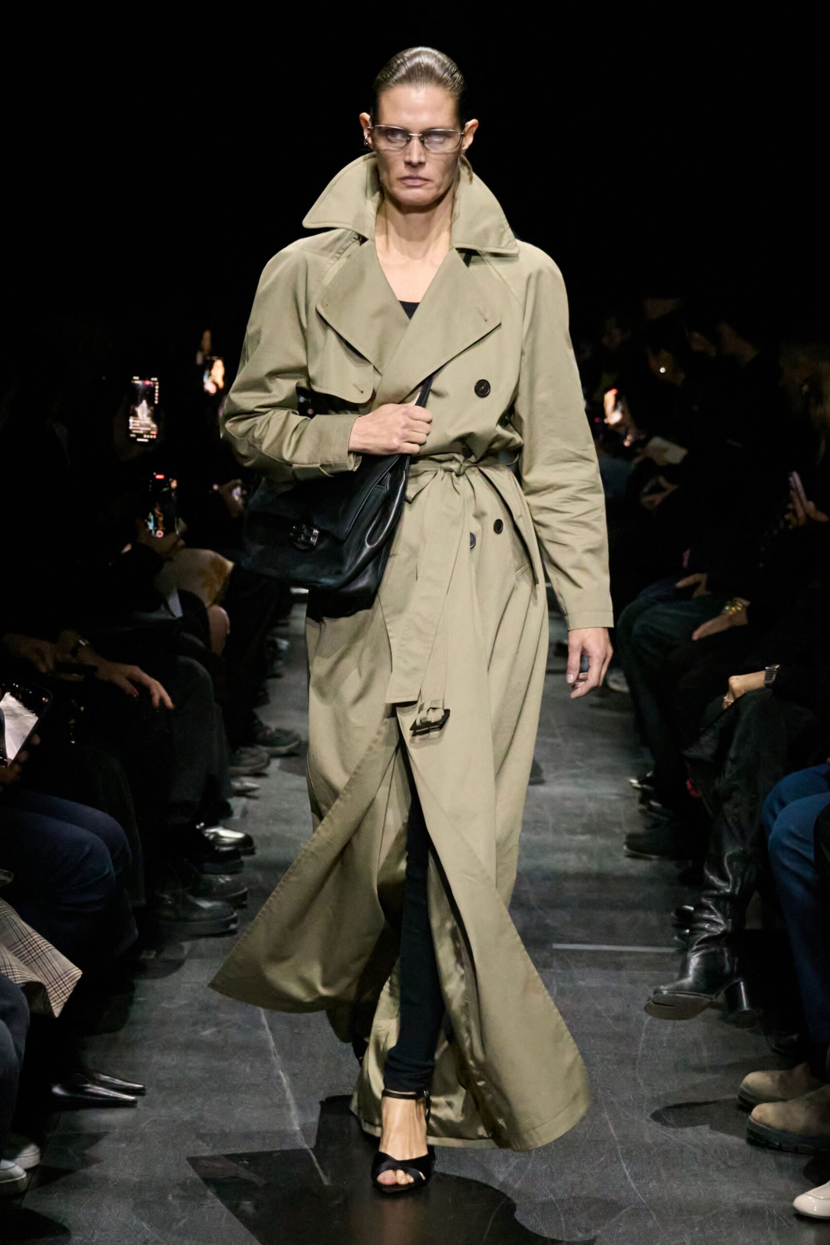 beige trench coat with black pants