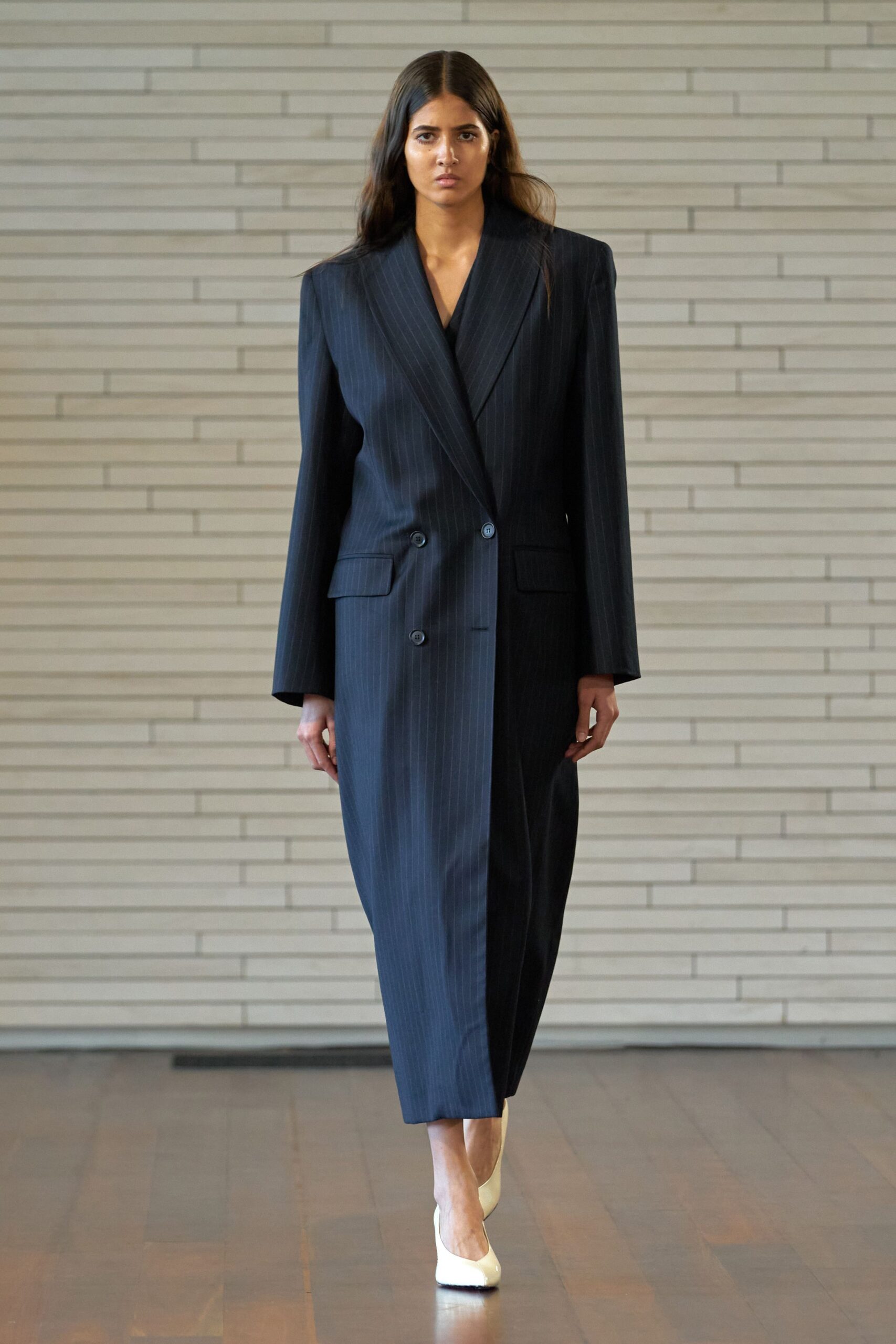 black tailored blazer and midi dress