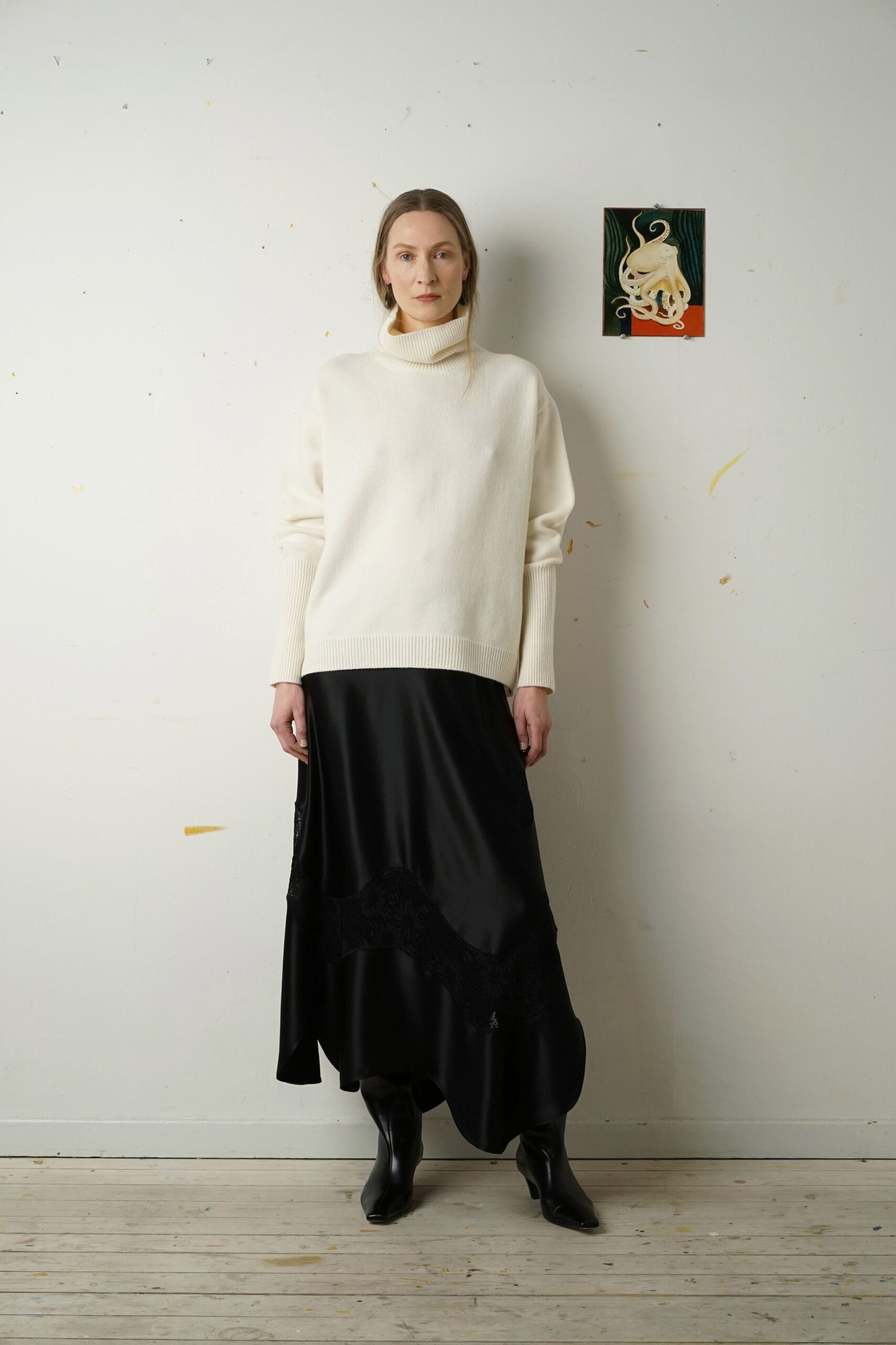 white relaxed sweater black midi skirt