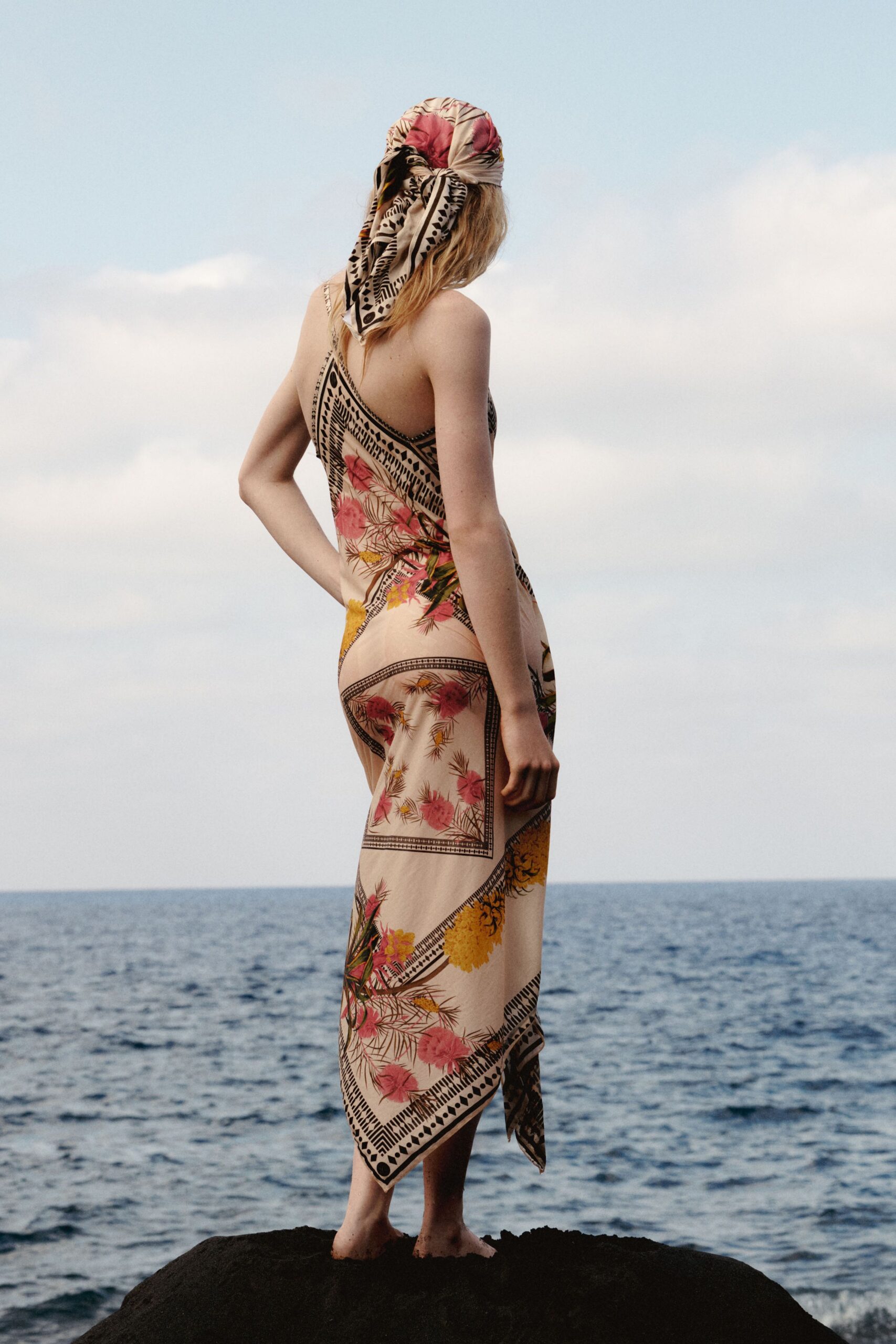 beige silk sleeveless v-neck fitted printed draped dress
