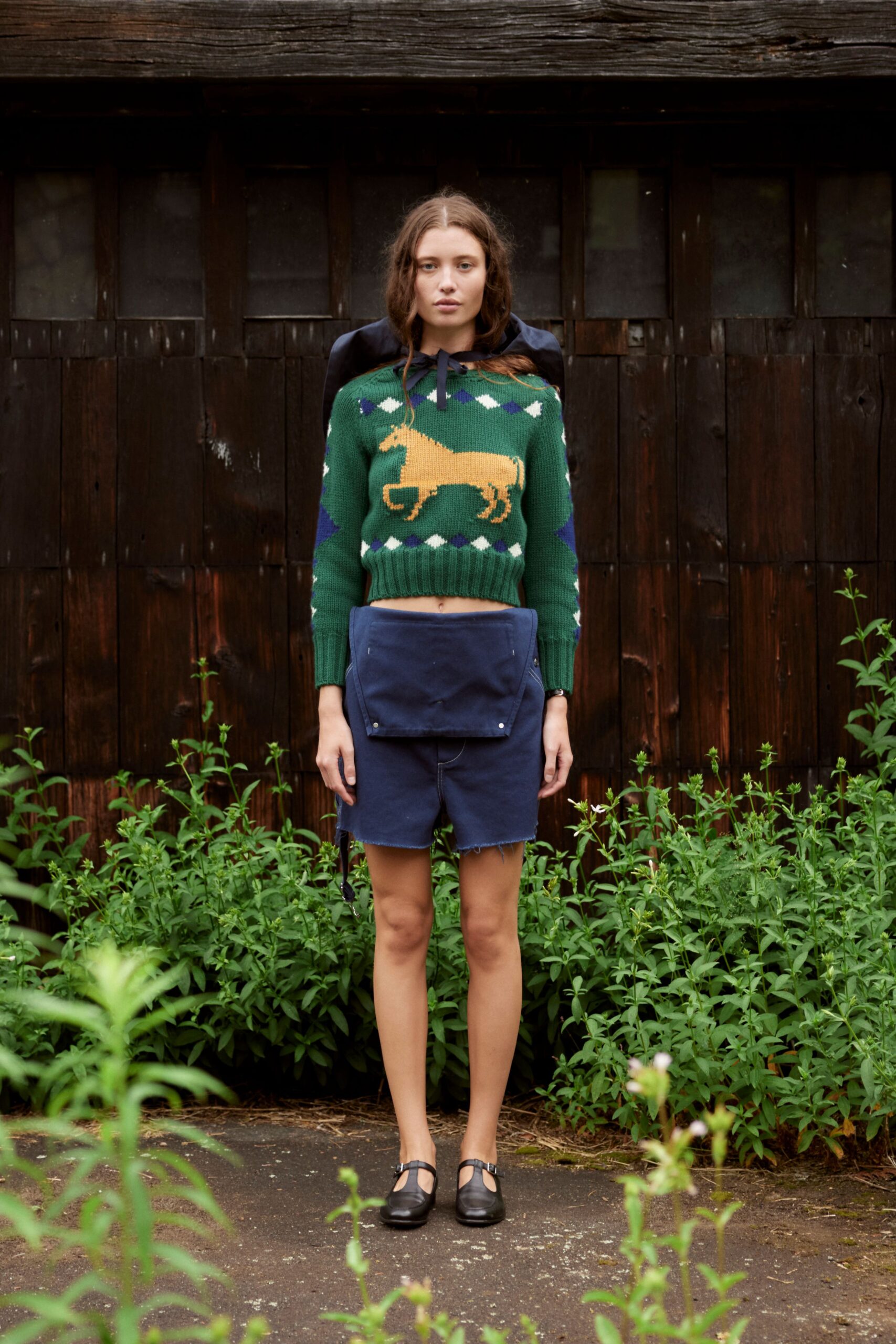 green wool sweater with shorts