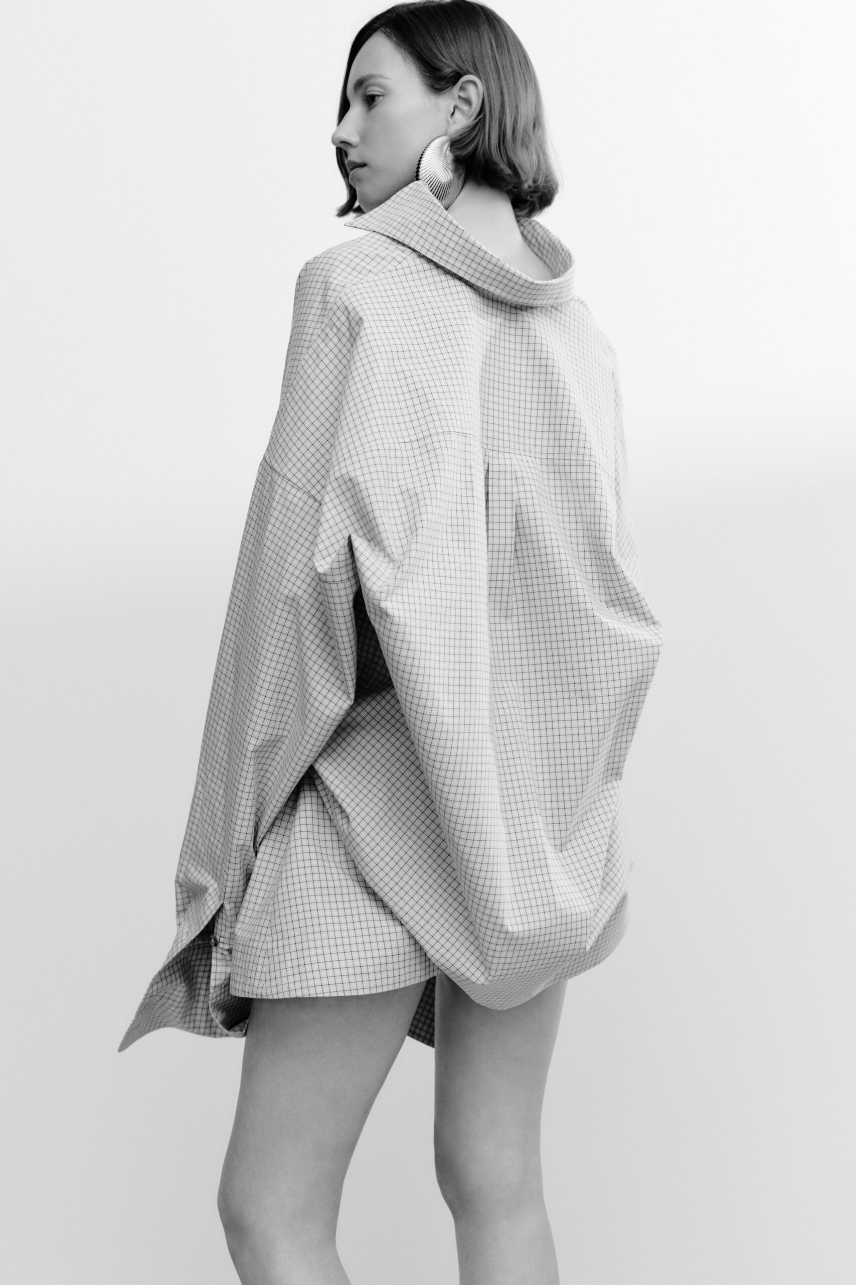 oversized checked high-neck top