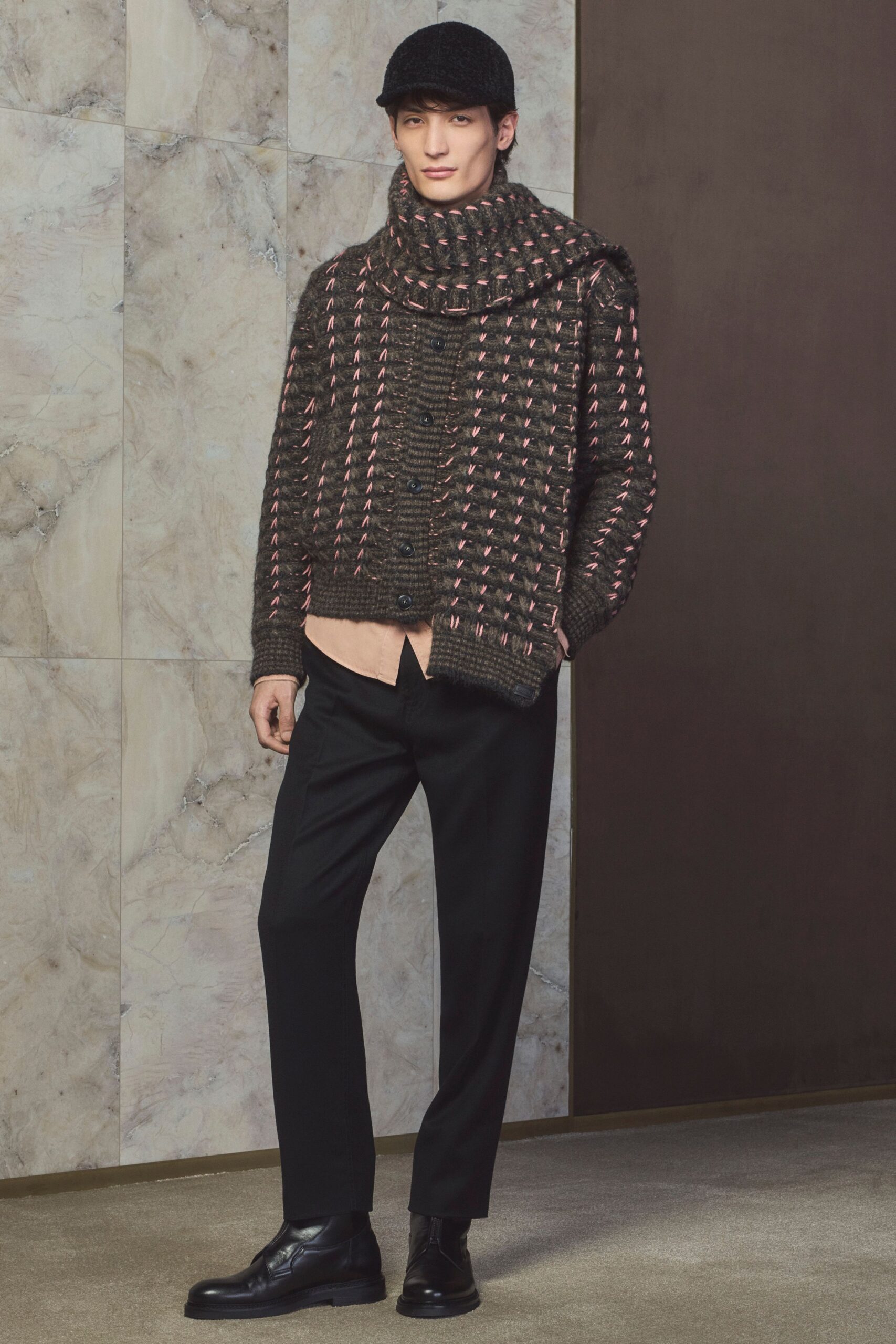 black wool sweater with beige shirt