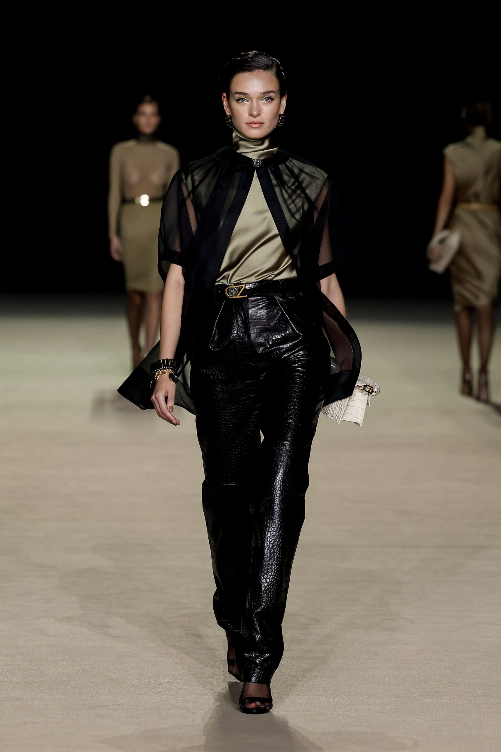black leather fitted pants with sheer top