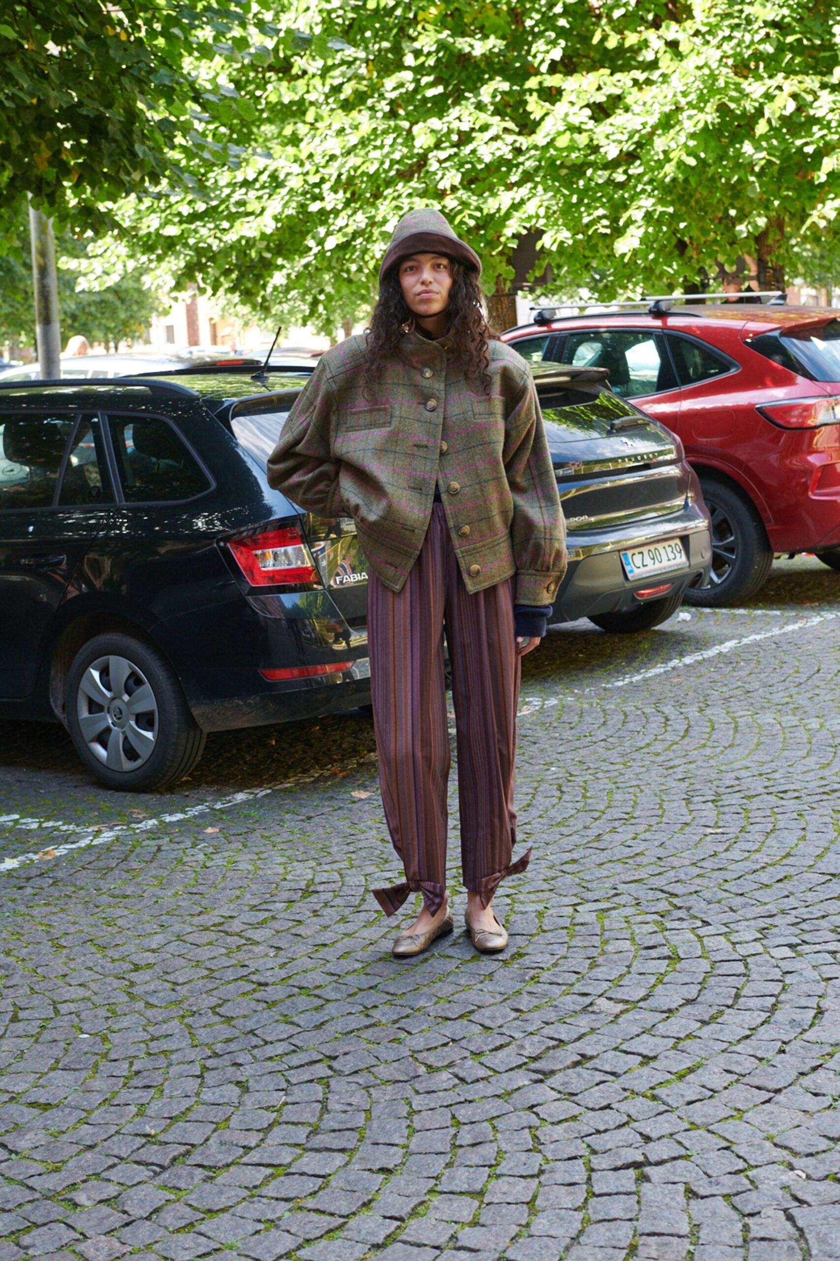 brown checked jacket with striped pants