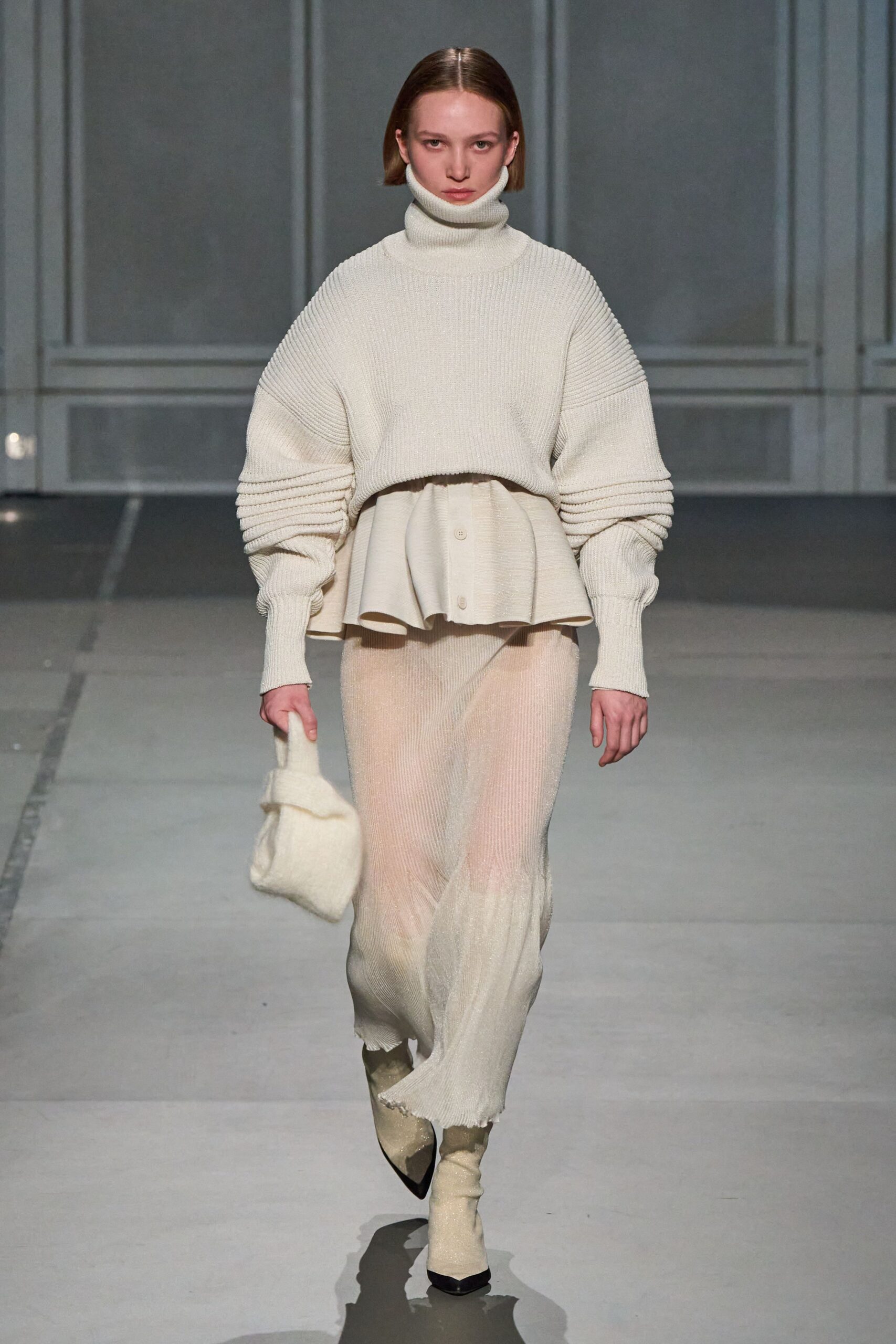 white oversized sweater and skirt