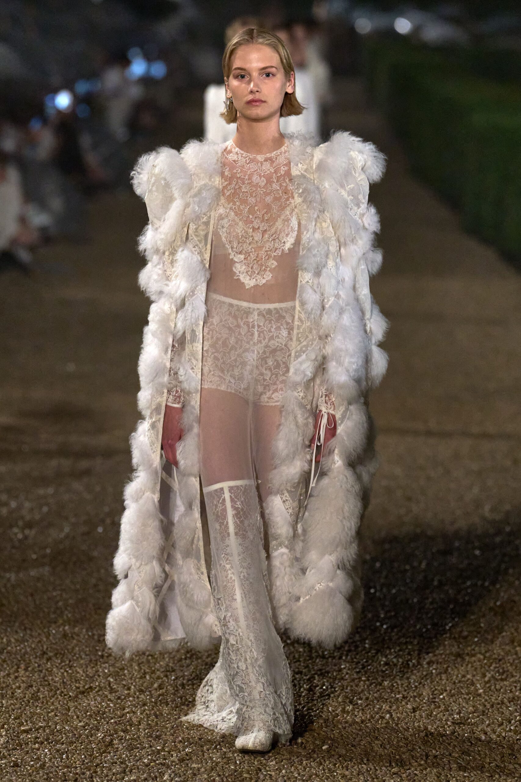 white lace gown with faux-fur