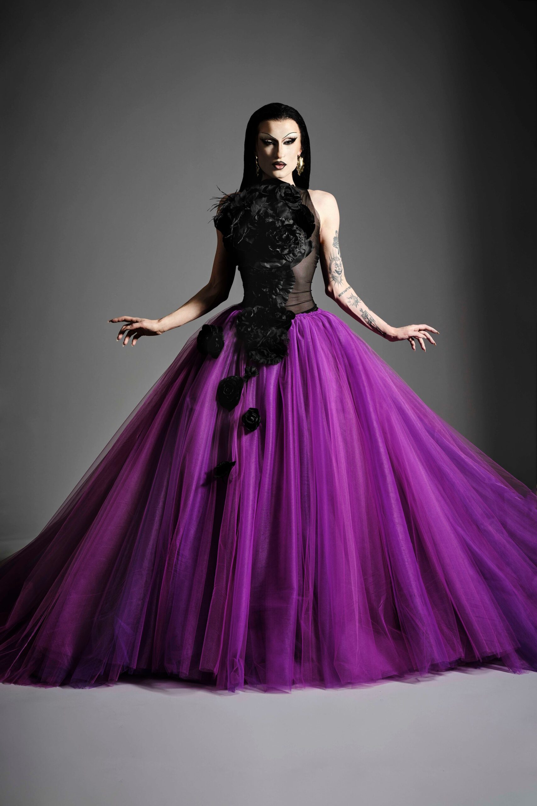 black and purple flowing gown