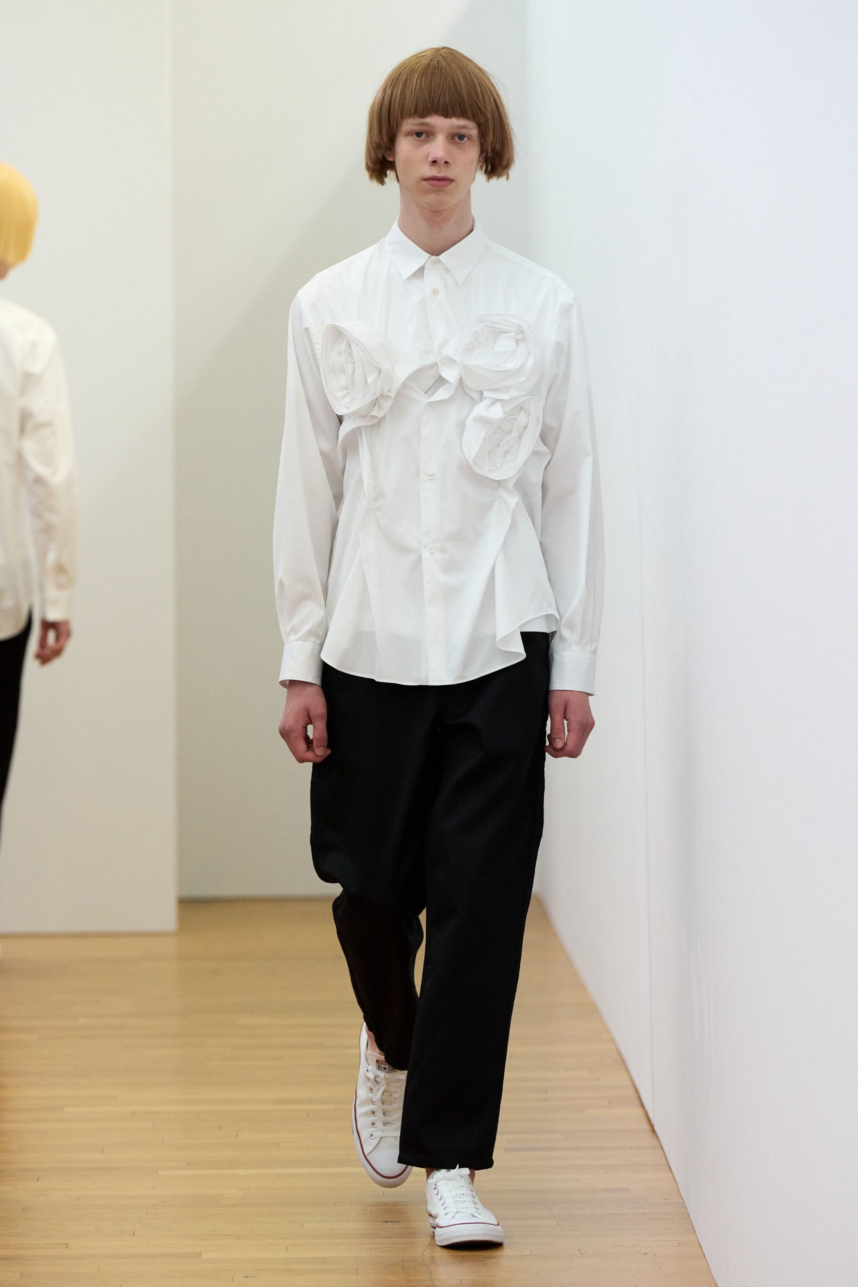 white relaxed shirt black pants