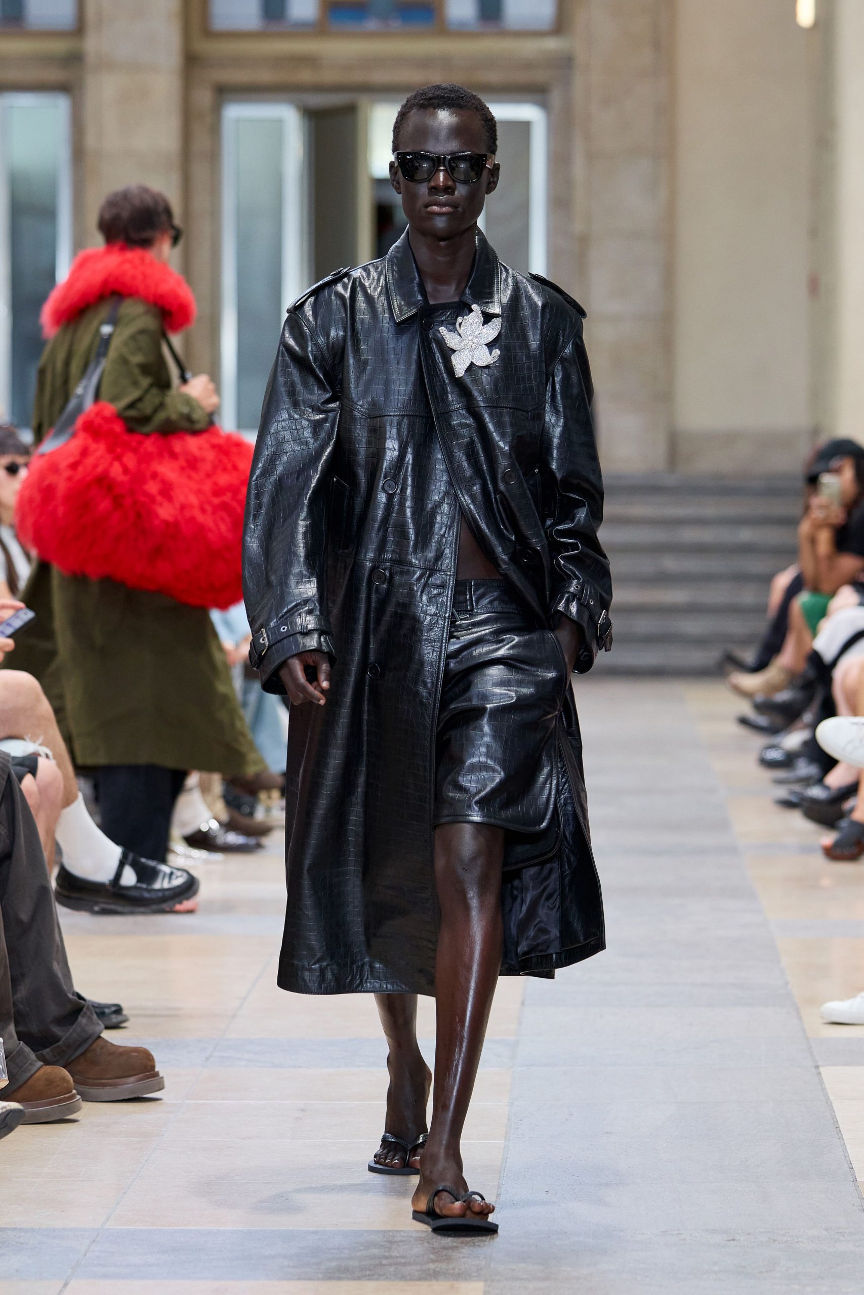black leather long-sleeve collared oversized zippered shiny coat