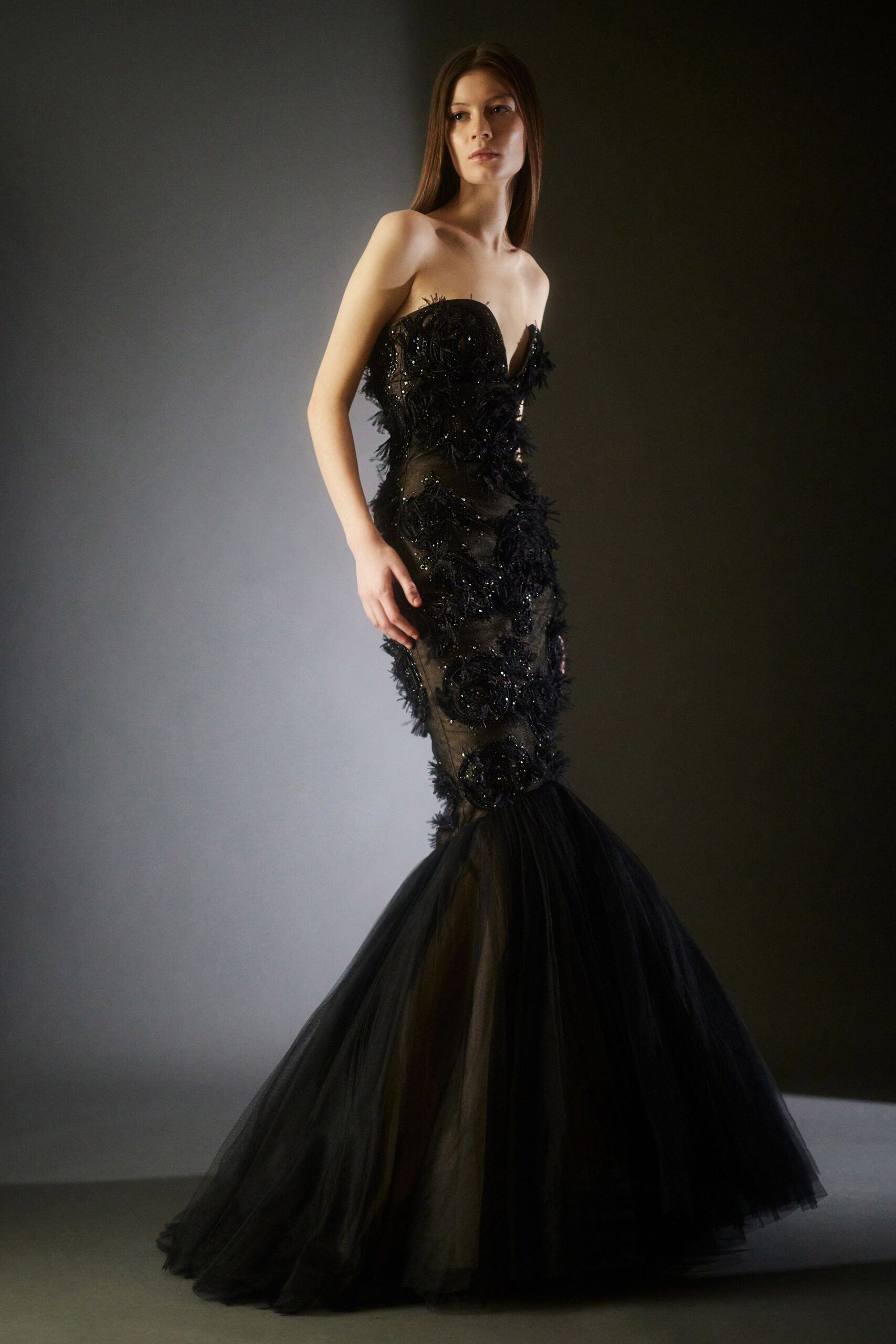 black strapless ruffled gown
