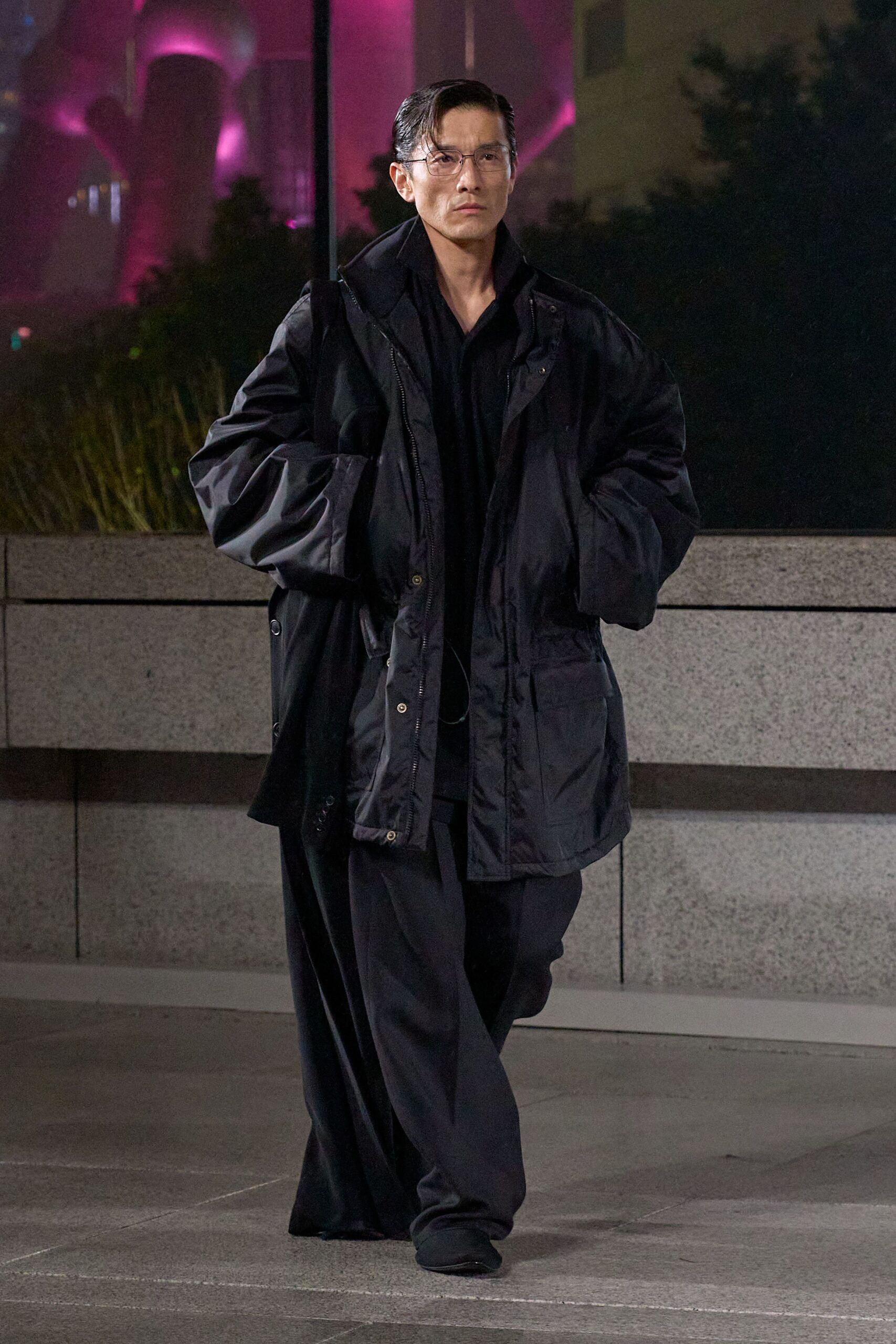 black relaxed coat with fitted shirt