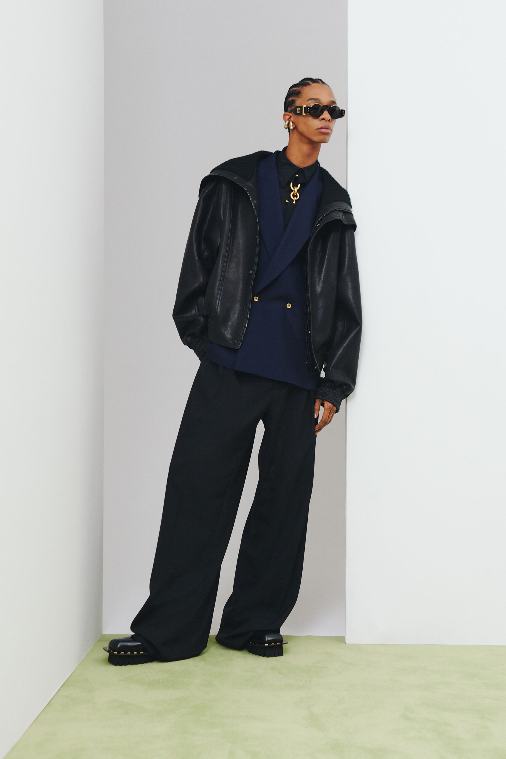 black leather long-sleeve collared oversized zippered pockets jacket