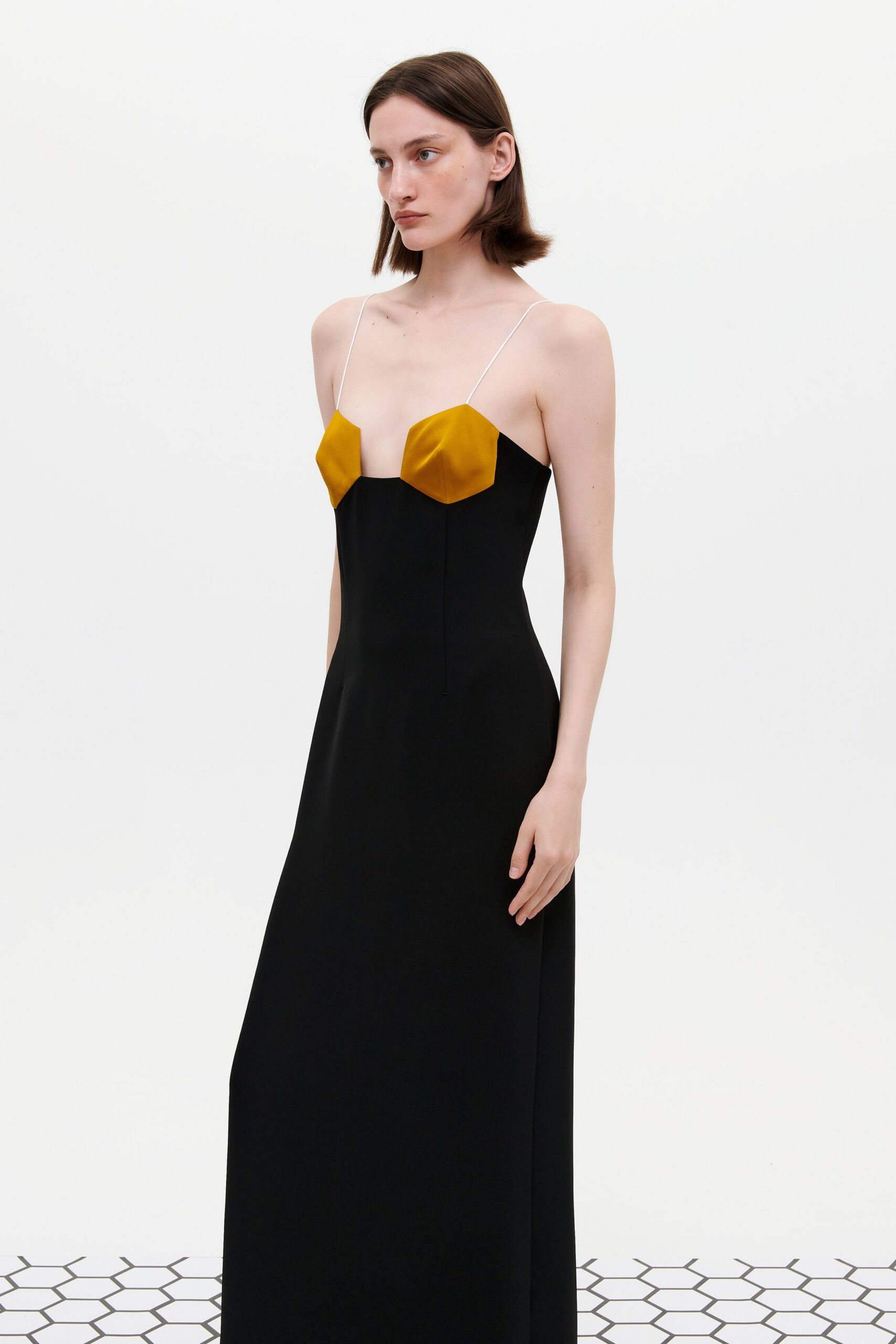 black and yellow color-blocked gown