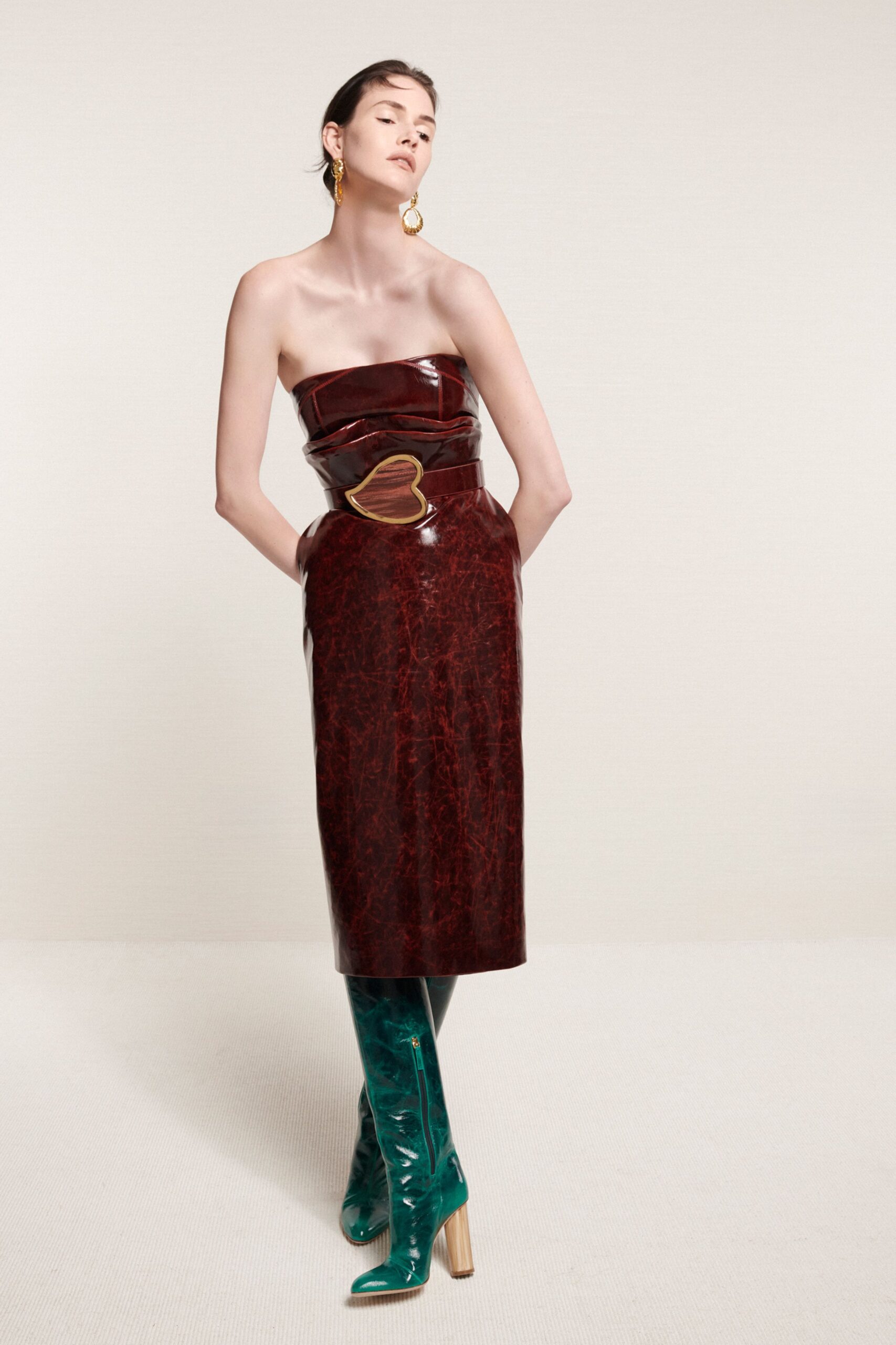 red vinyl strapless fitted pencil belted shiny dress
