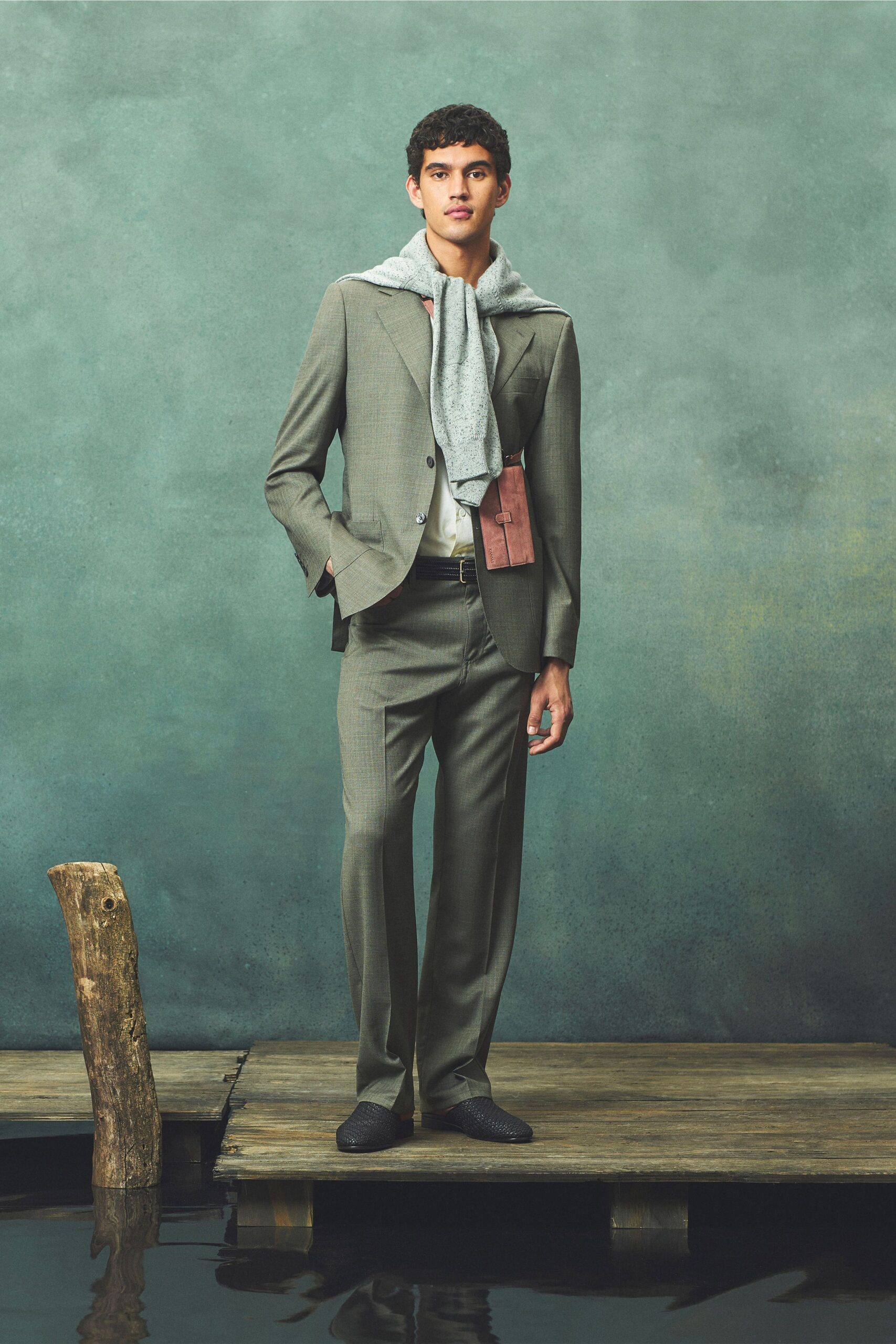 gray tailored suit with sweater