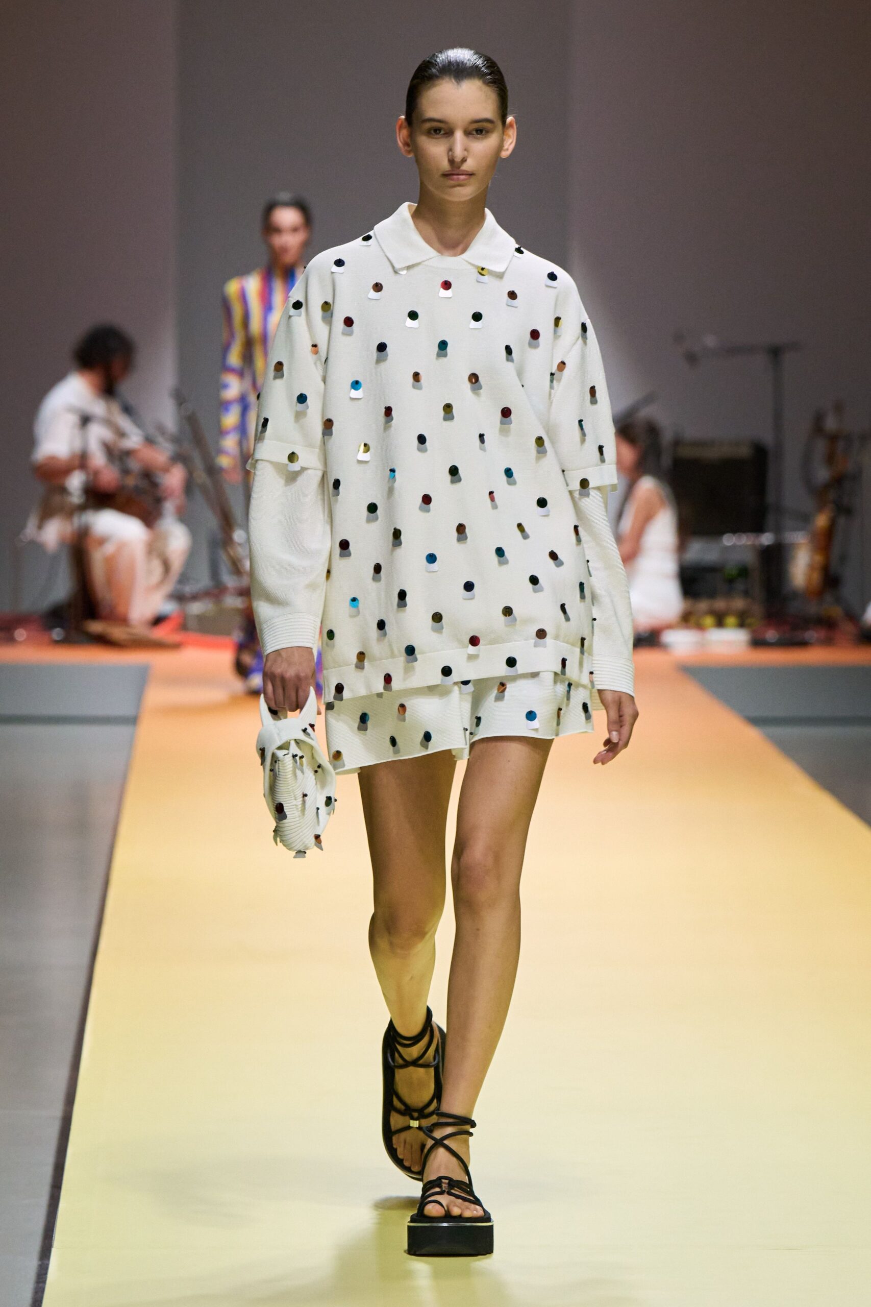 white embroidered top and mini skirt