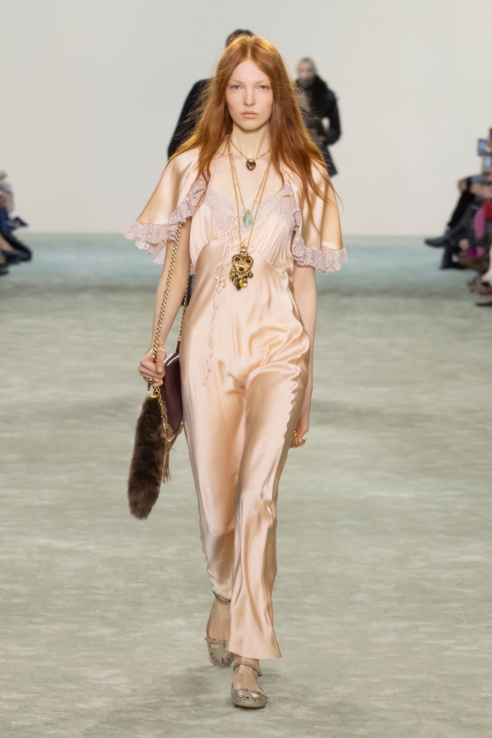 pink silk sleeveless v-neck fitted ruffled shiny jumpsuit