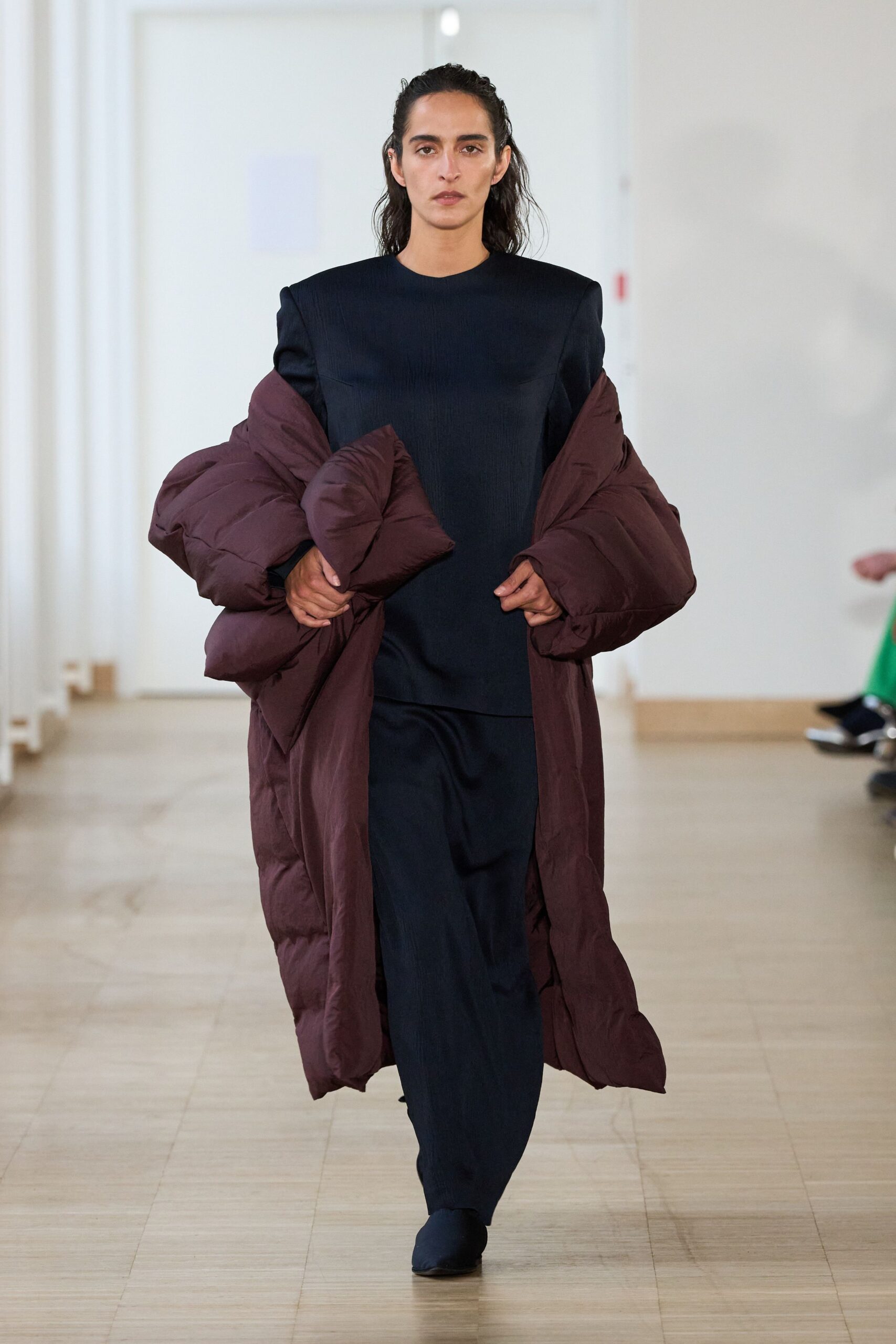 brown padded coat with blue outfit