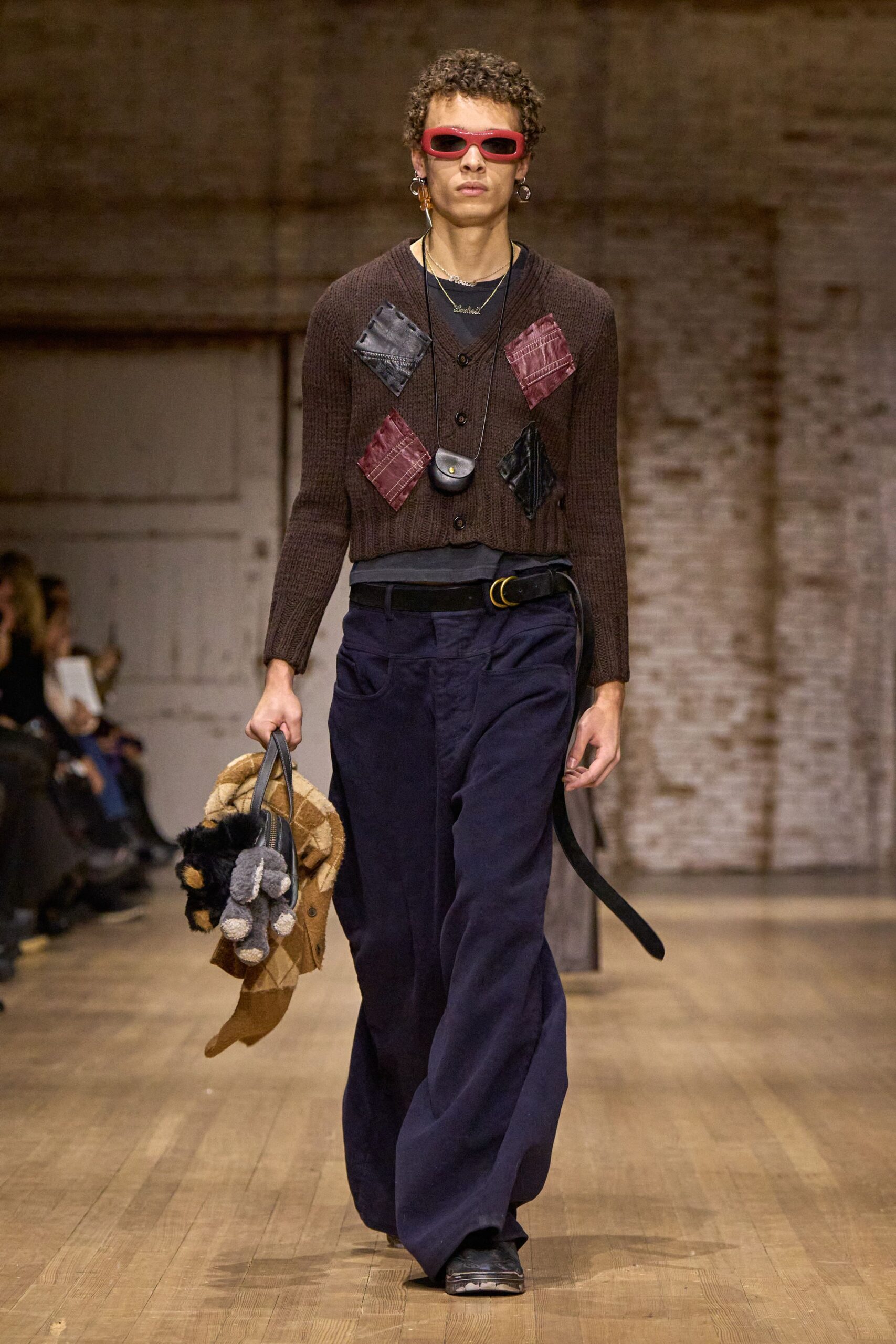 brown cardigan with navy pants