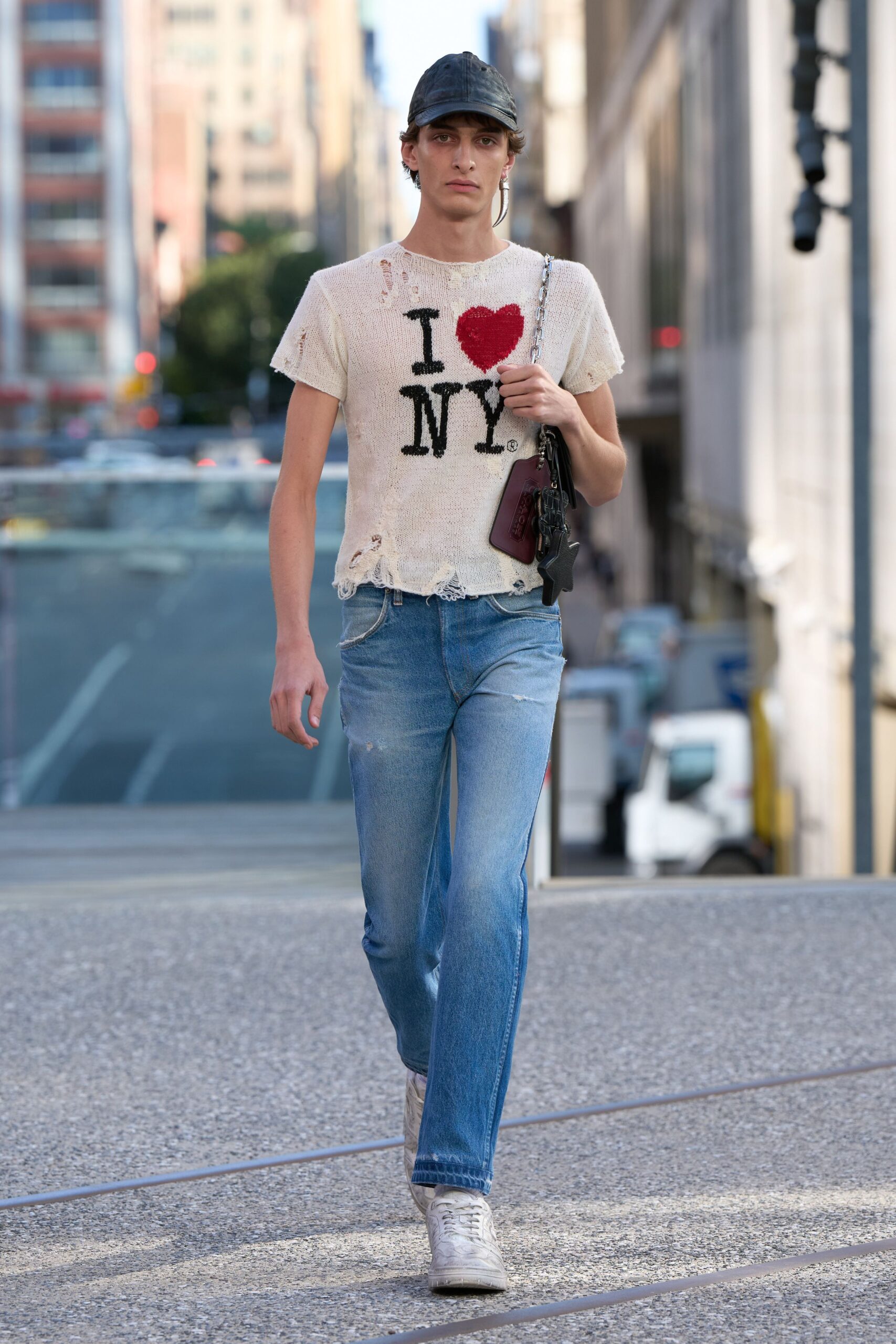 beige distressed t-shirt with blue jeans