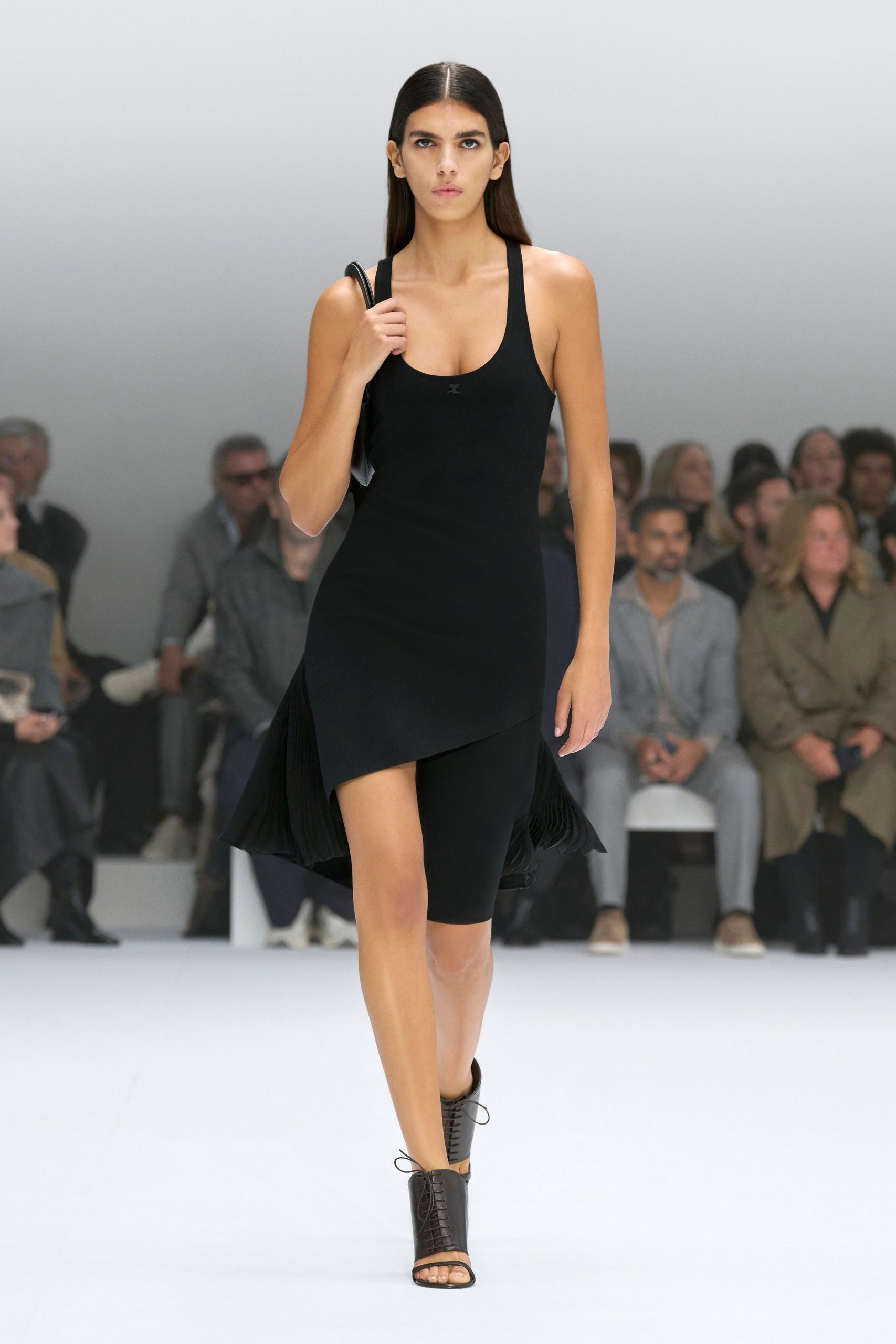 black fitted asymmetric dress with shoes