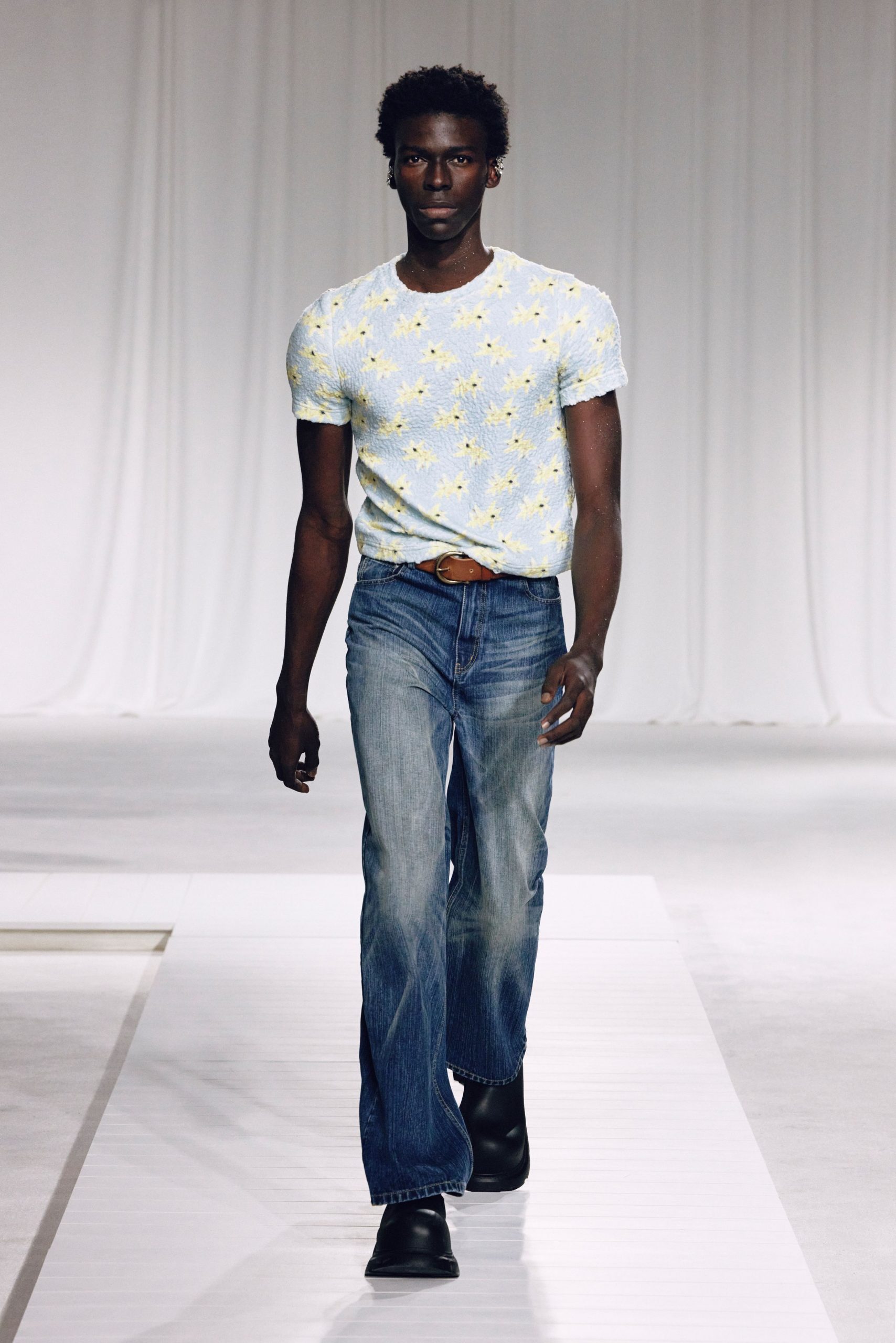 blue floral t-shirt with jeans and boots