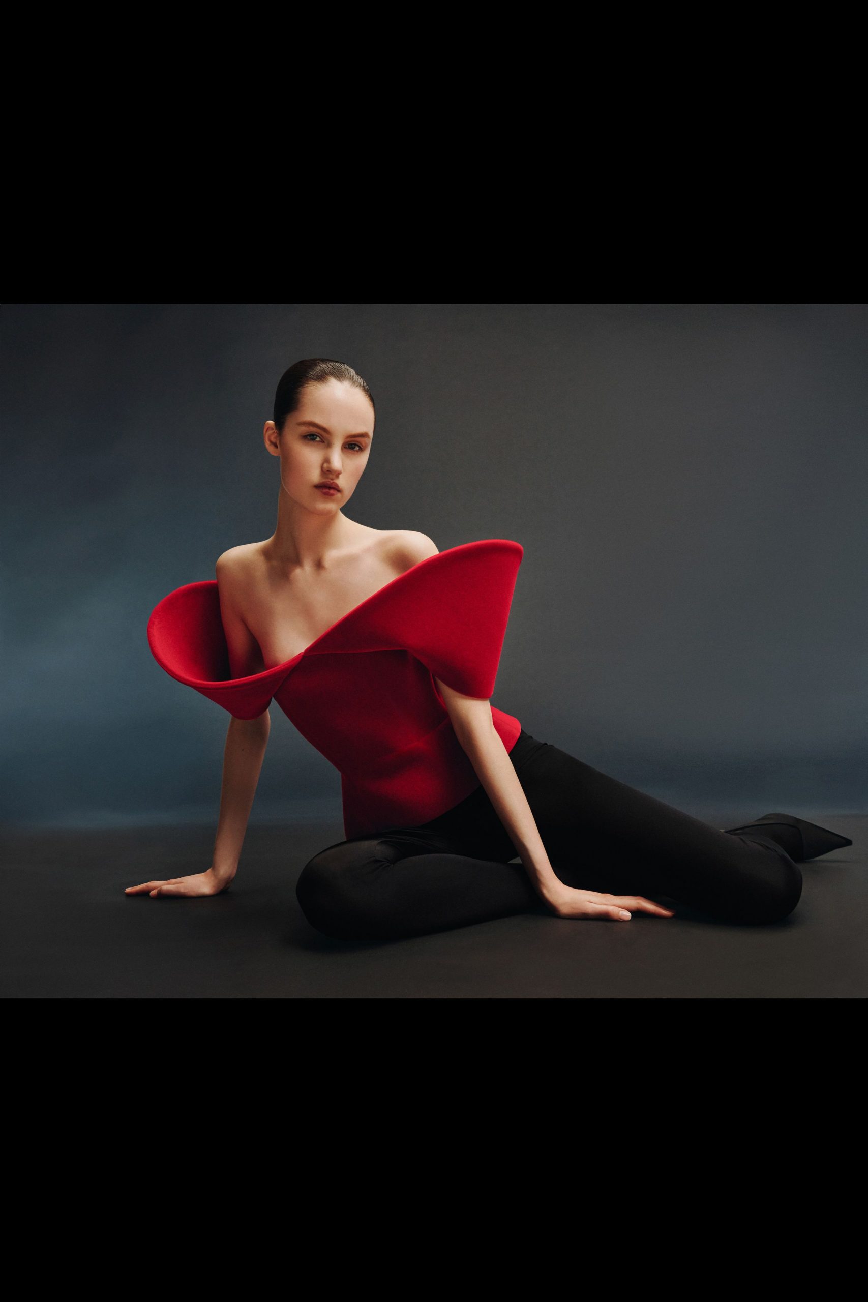red wool sleeveless off-shoulder fitted draped top
