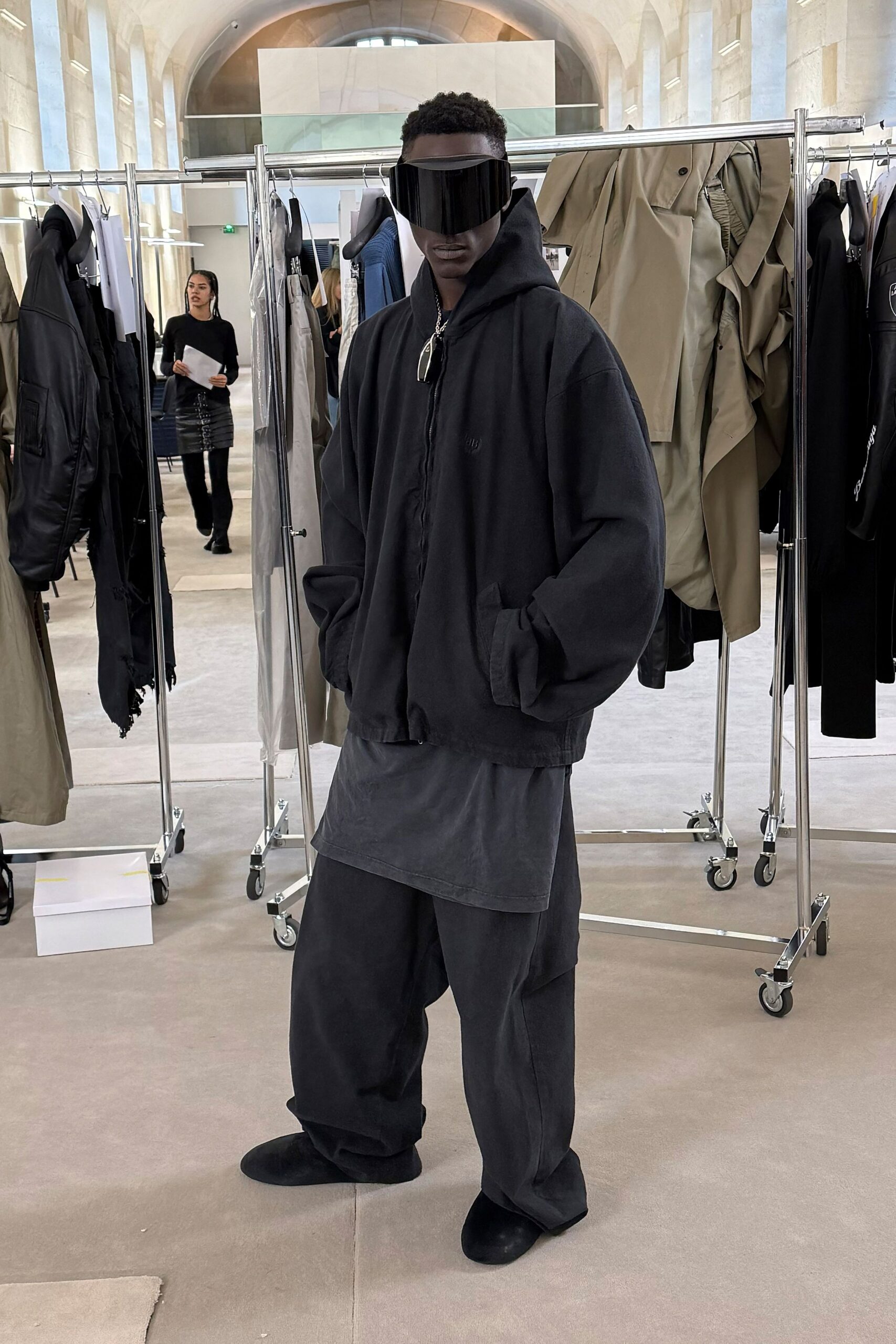 black oversized hoodie and relaxed pants