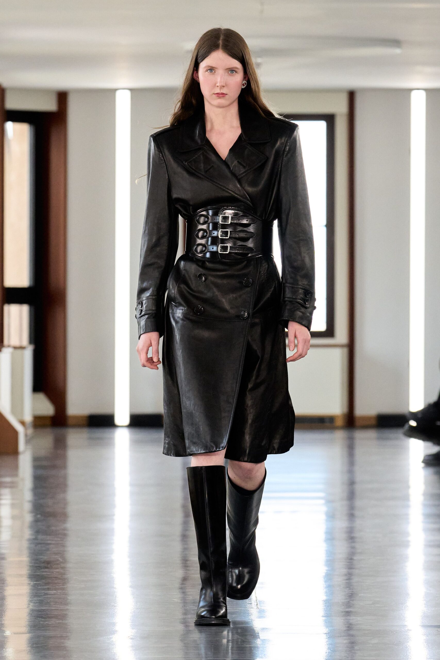 black leather belted coat and boots