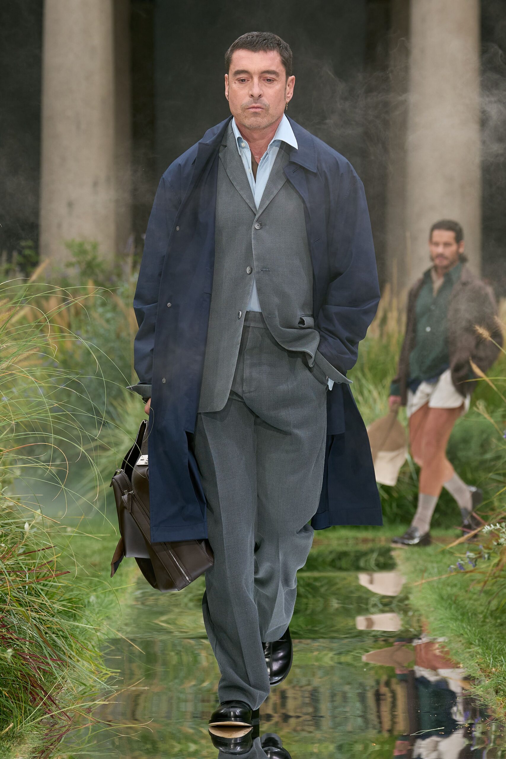navy coat gray suit black shoes