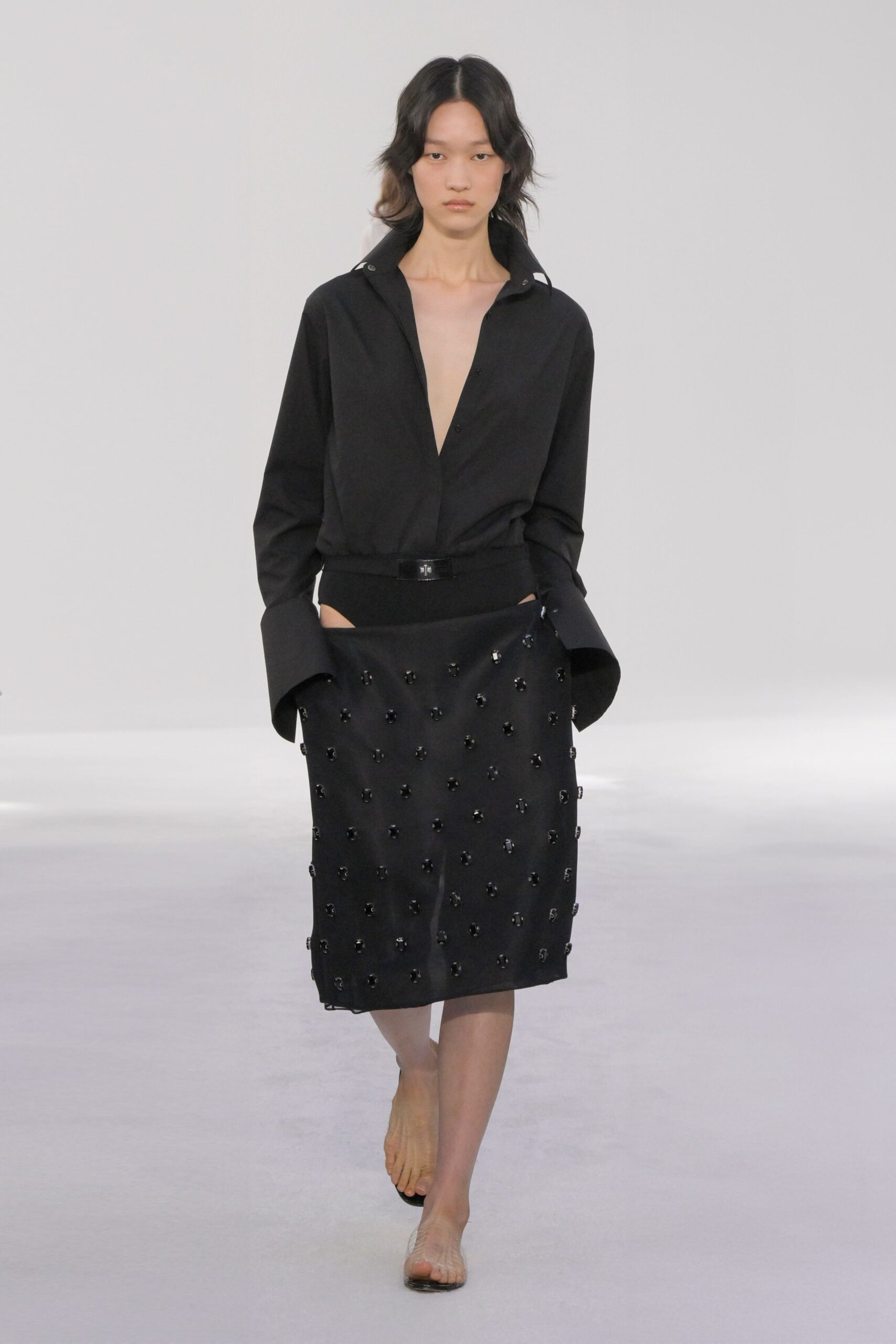 black relaxed shirt and fitted skirt