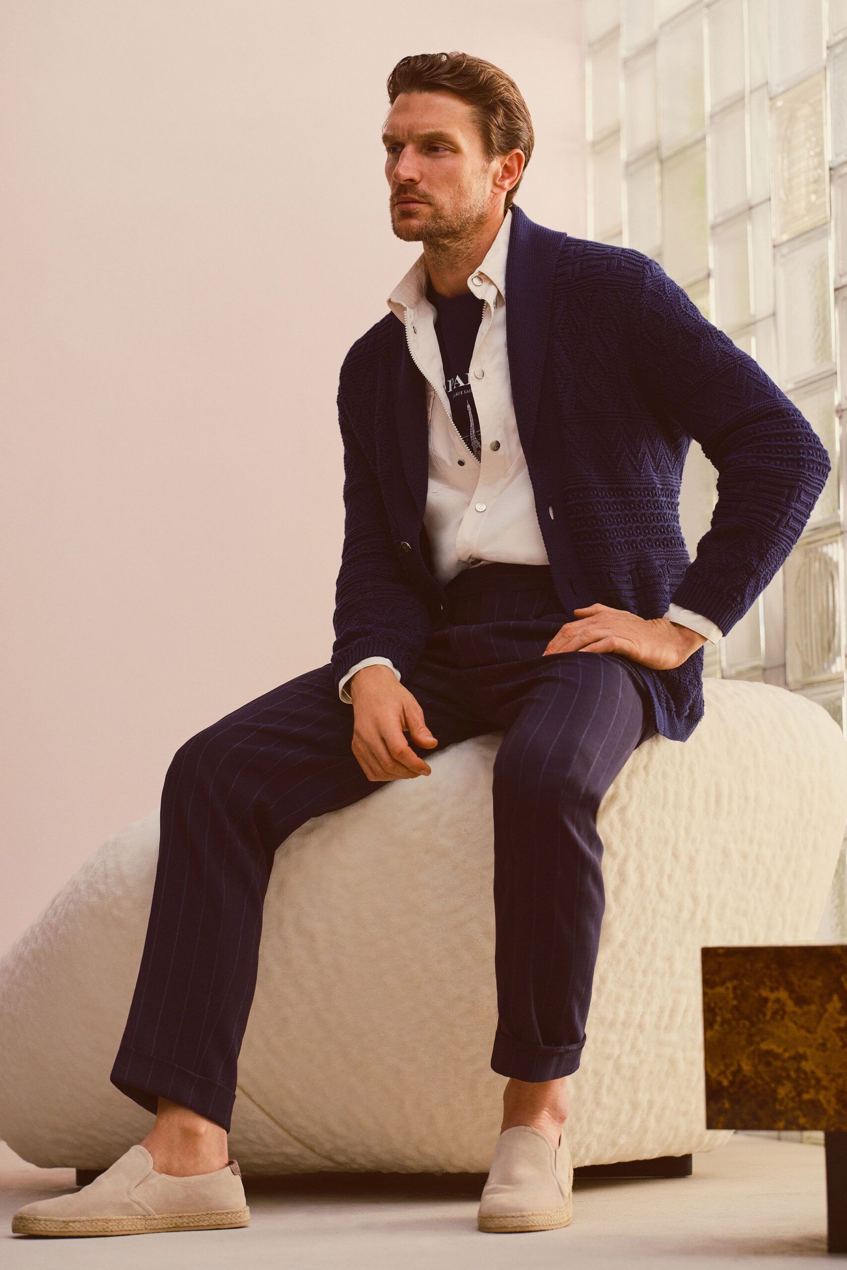 navy relaxed sweater with white shirt