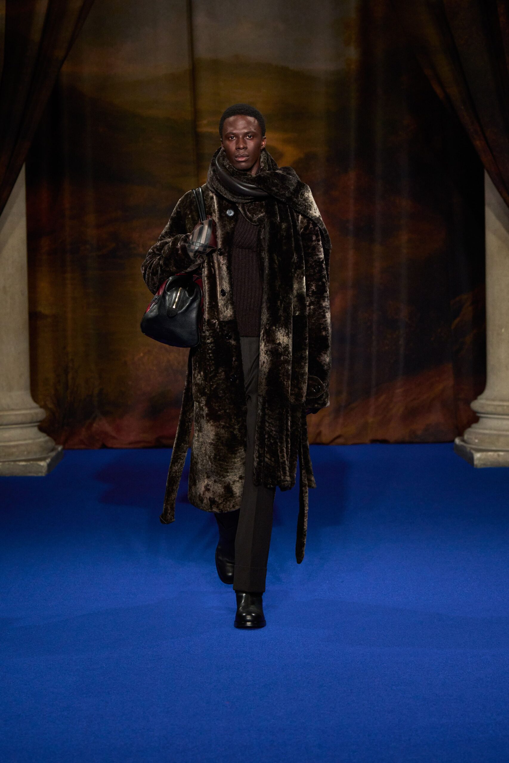 brown fur coat with black sweater