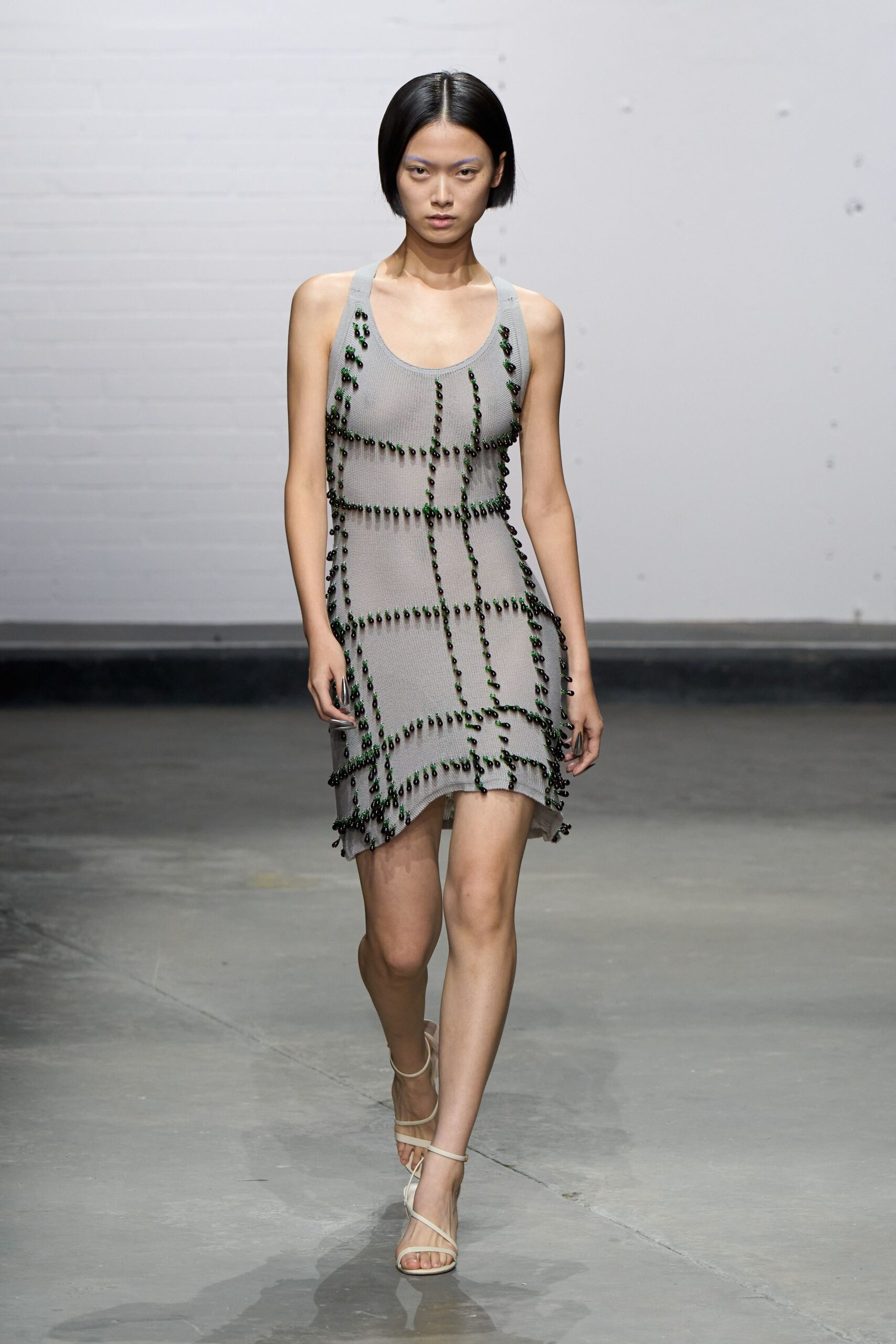 gray silk sleeveless v-neck fitted pleated embroidered dress