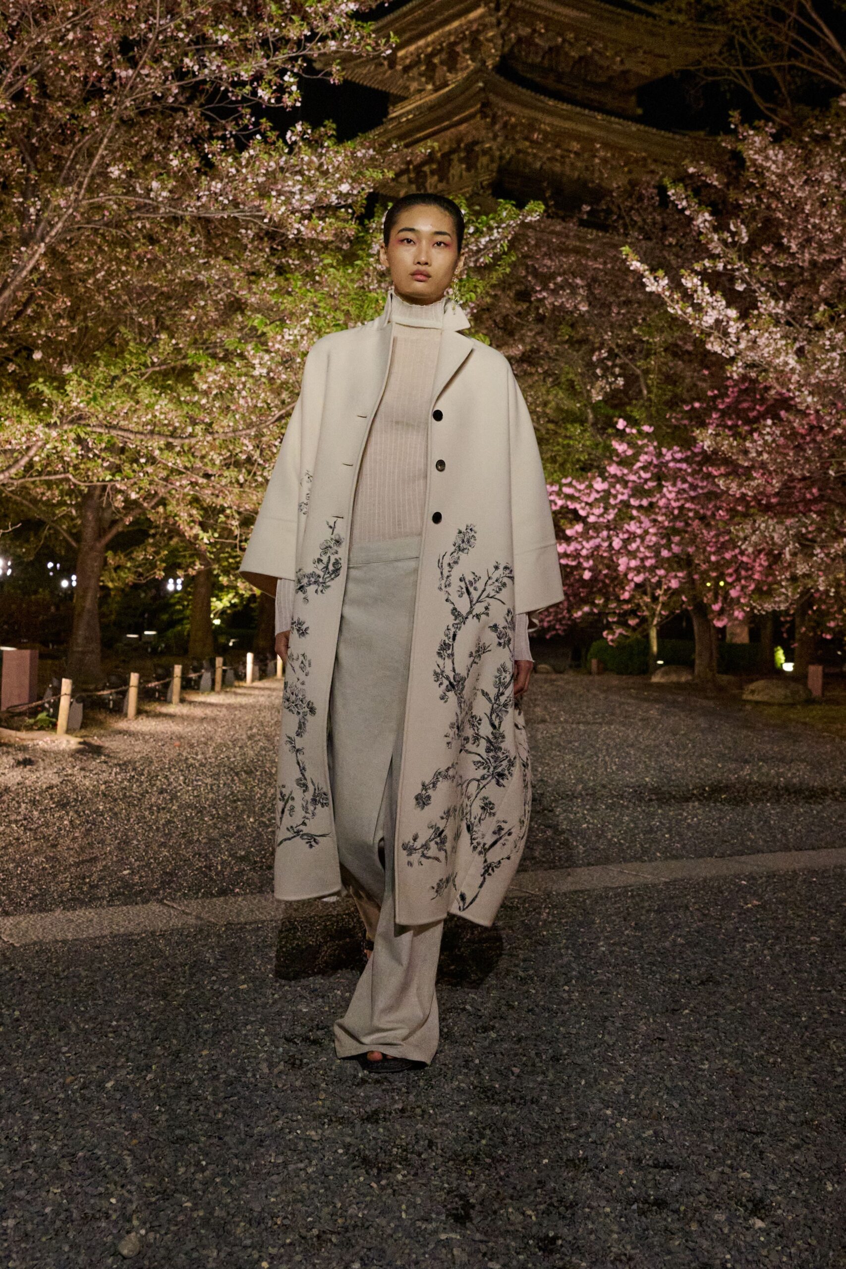 white embroidered coat with beige top